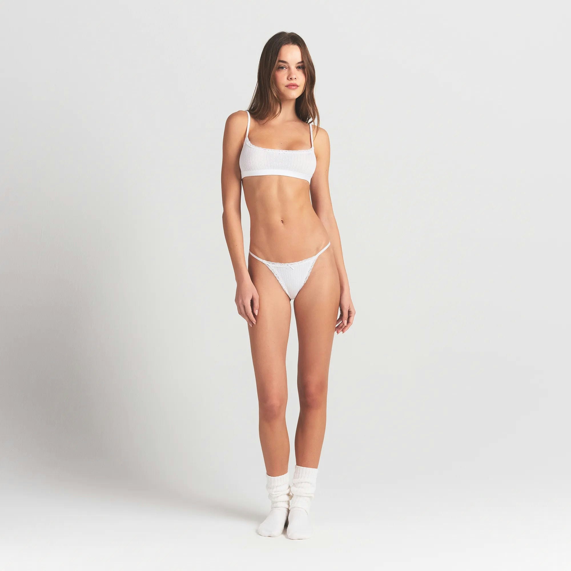 LIGHTWEIGHT COTTON POINTELLE SCOOP BRALETTE | SNOW ON A MODEL FRONT VIEW @ | FOCUS: 0.0, 1.0, 0.9