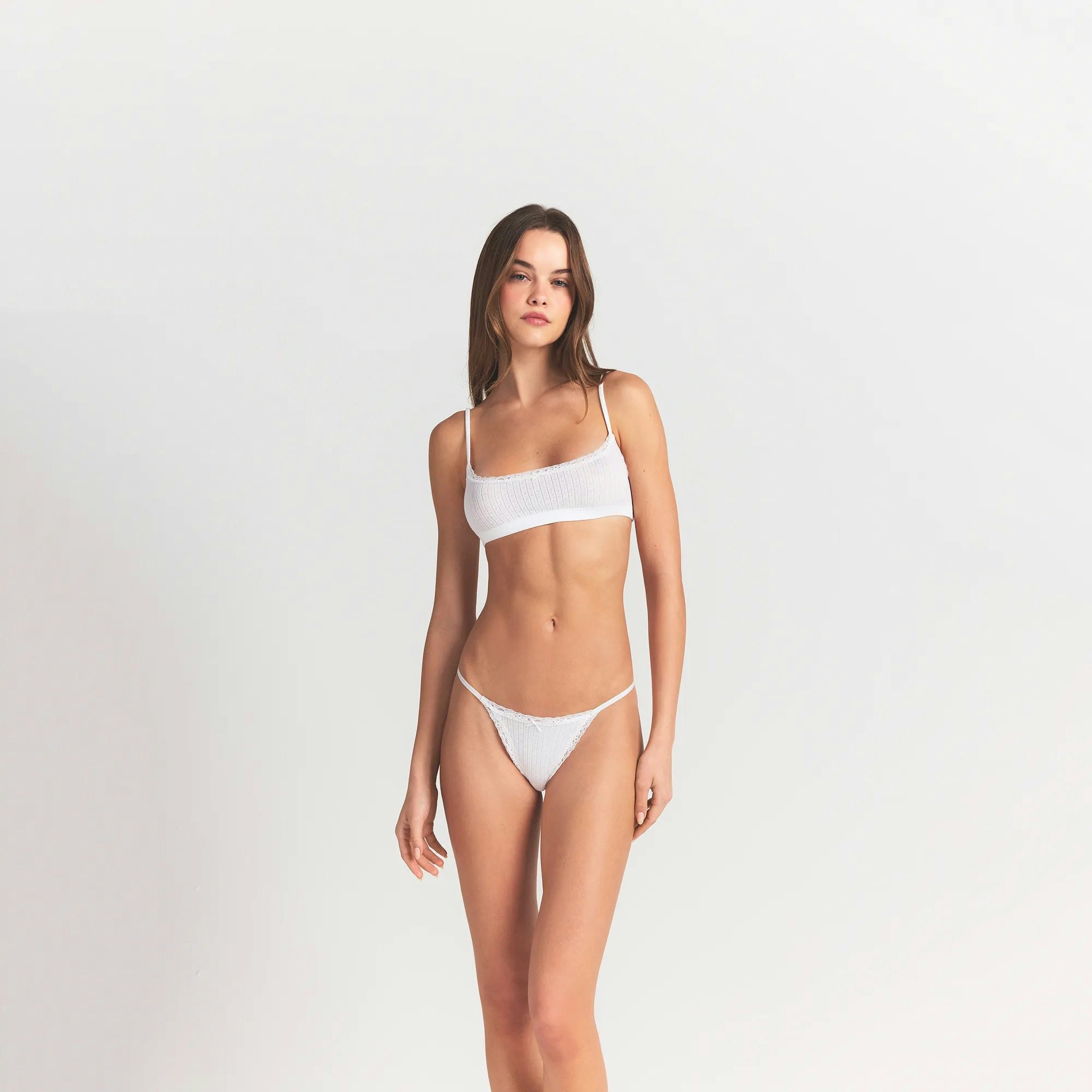 LIGHTWEIGHT COTTON POINTELLE SCOOP BRALETTE | SNOW ON A MODEL FRONT VIEW @ | FOCUS: 0.0, 1.0, 0.9