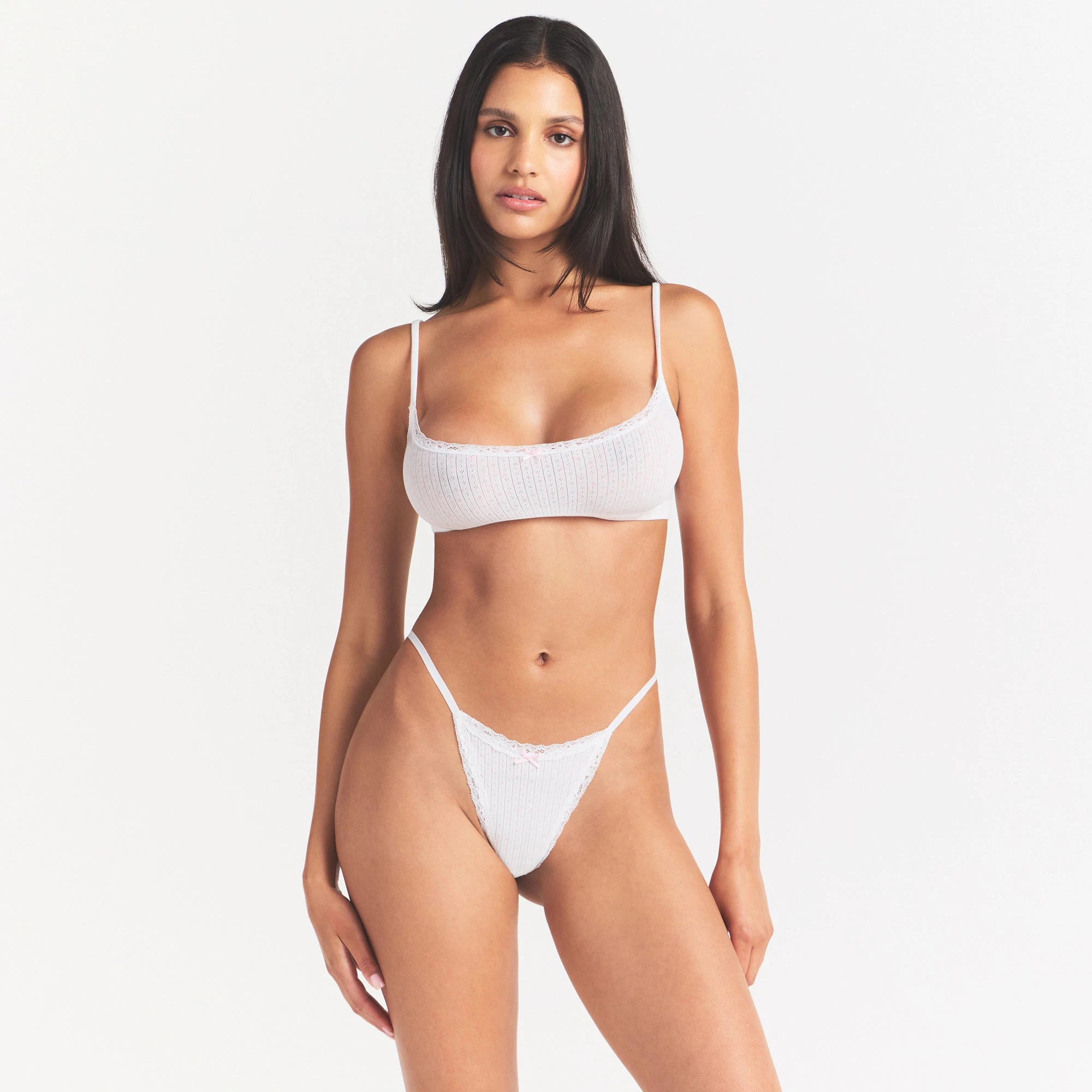LIGHTWEIGHT COTTON POINTELLE SCOOP BRALETTE | SNOW PEONY PIN DOT ON A MODEL SIDE VIEW