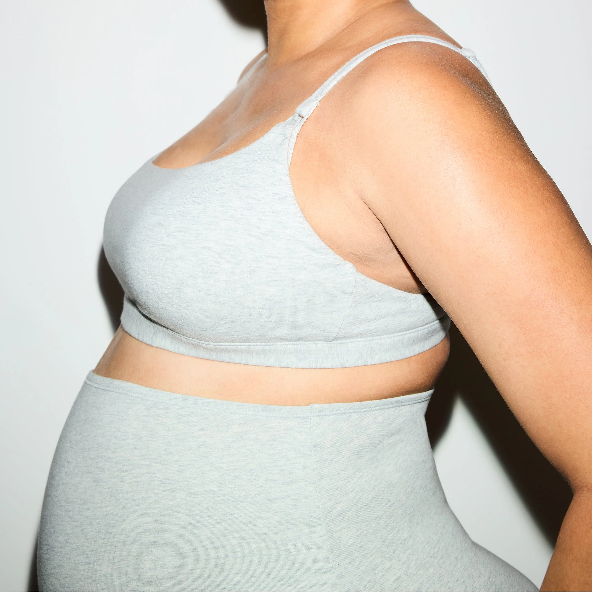 COTTON JERSEY MATERNITY NURSING SCOOP BRALETTE 2-PACK | LIGHT HEATHER GREY ON A MODEL SIDE VIEW @ | FOCUS: 0.0, 1.0, 0.9