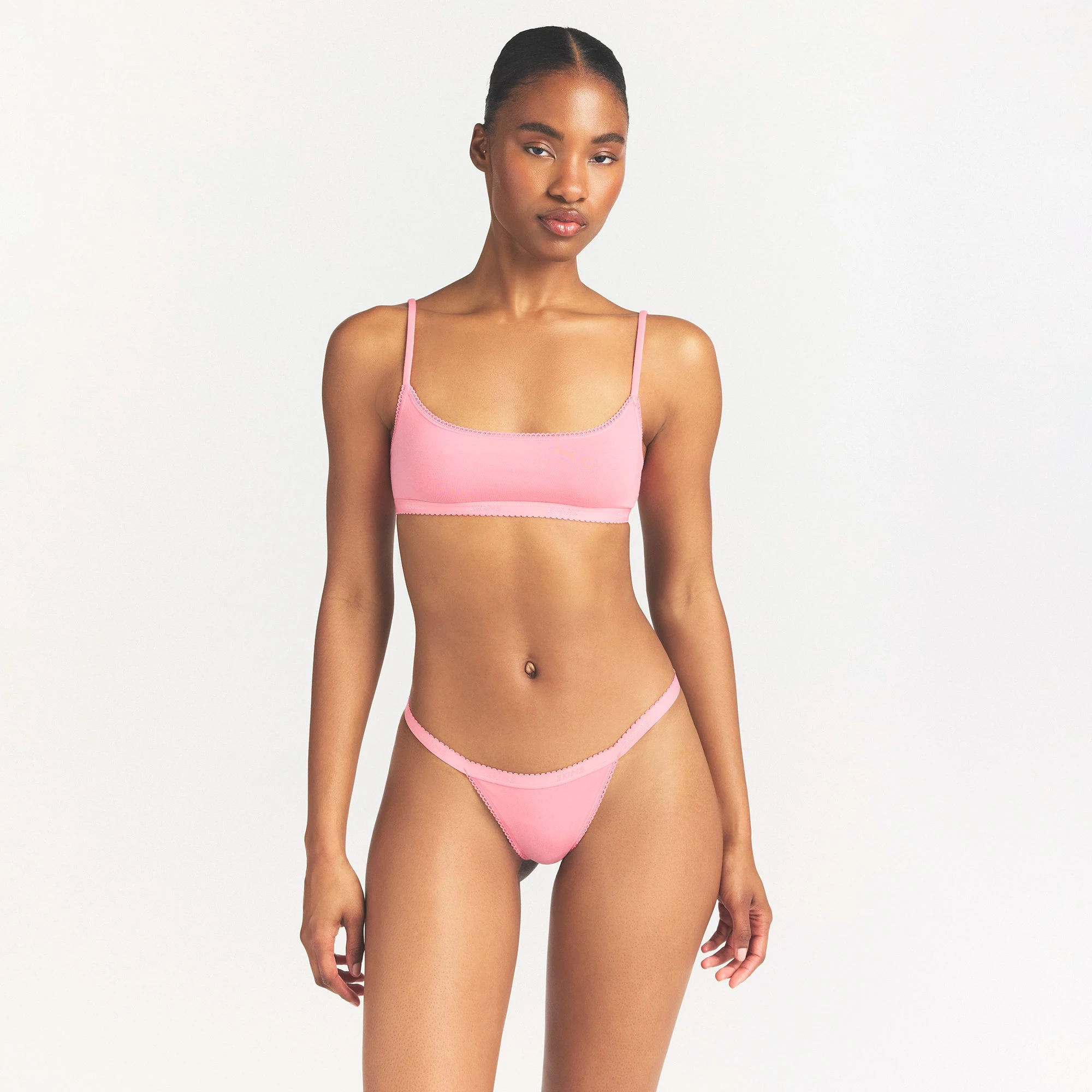 LIGHTWEIGHT COTTON LOGO PICOT SCOOP BRALETTE | MELON TONAL ON A MODEL SIDE VIEW @ | FOCUS: 0.0, 1.0, 0.9