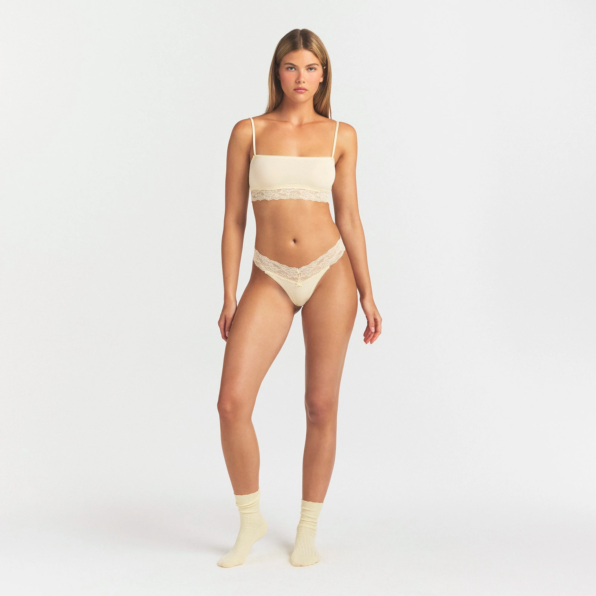 LIGHTWEIGHT COTTON STRAIGHT NECK BRALETTE | BUTTER TONAL ON A MODEL FRONT VIEW @ | FOCUS: 0.0, 1.0, 0.9