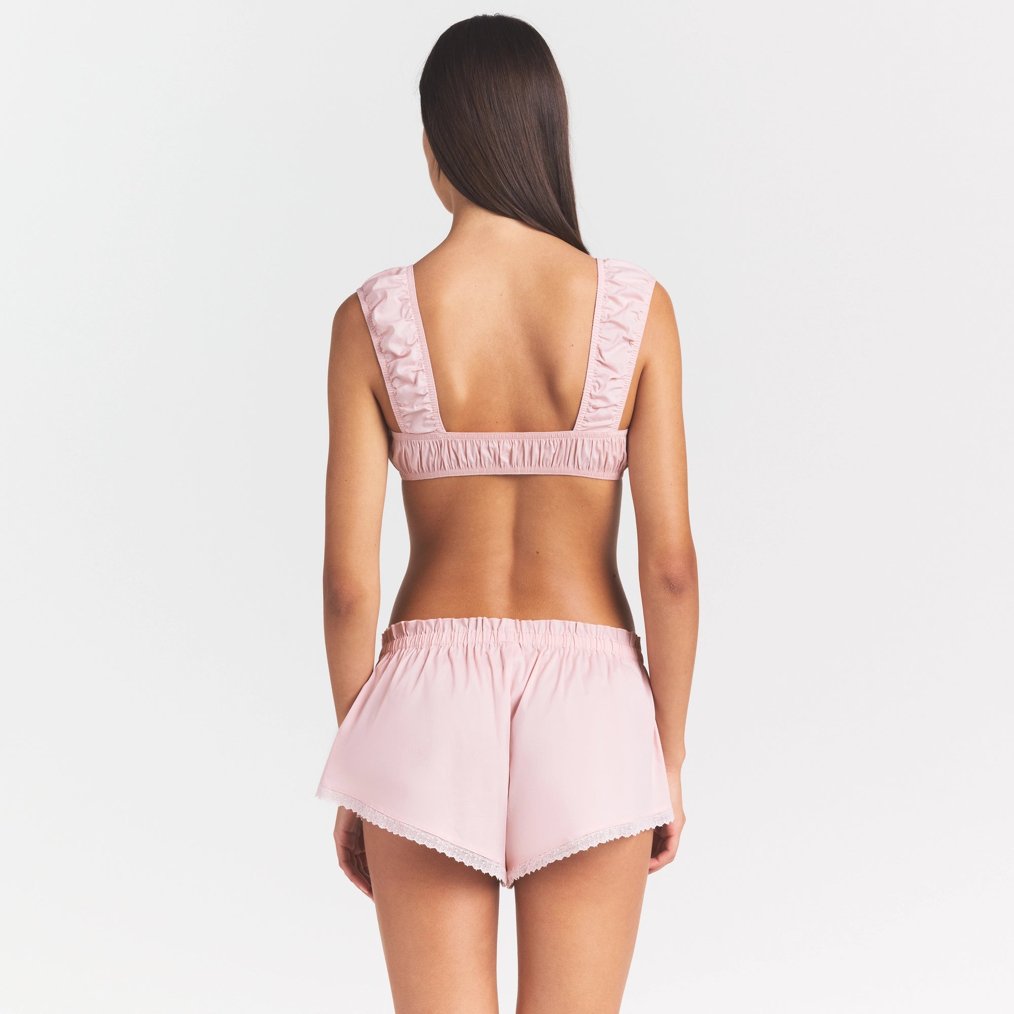 COTTON POPLIN BRALETTE | DUSTY PINK ON A MODEL SIDE VIEW @ | FOCUS: 0.0, 1.0, 0.9