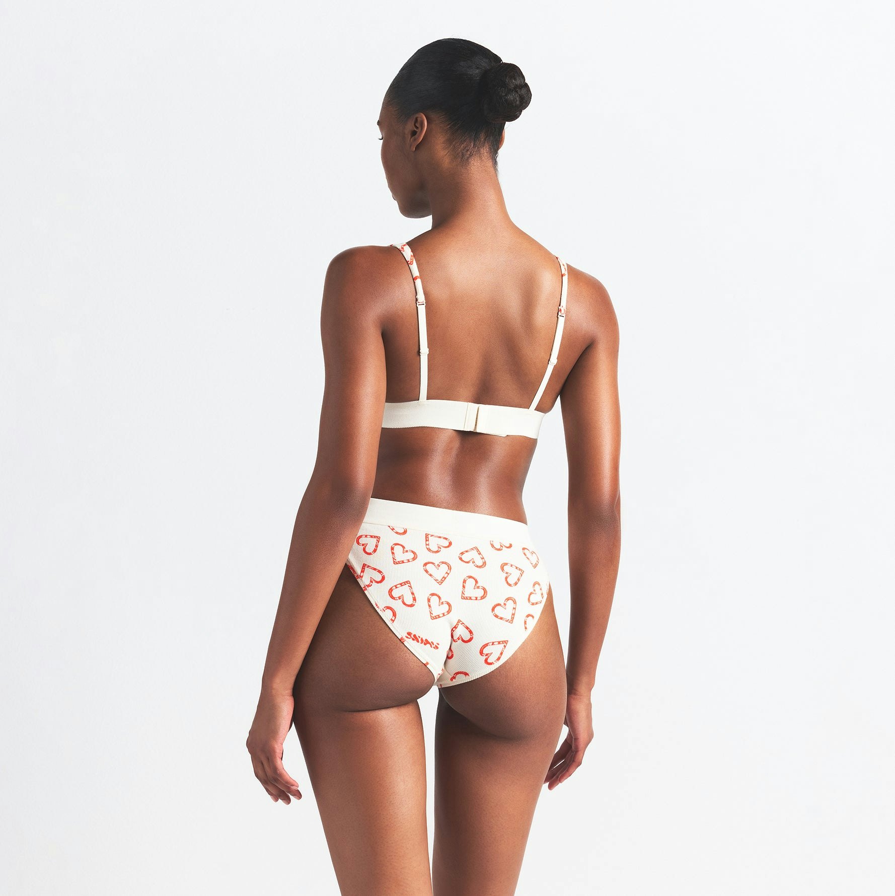 COTTON RIB PLUNGE BRALETTE | MARBLE CANDY HEART PRINT ON A MODEL BACK VIEW @ | FOCUS: 0.0, 1.0, 0.9