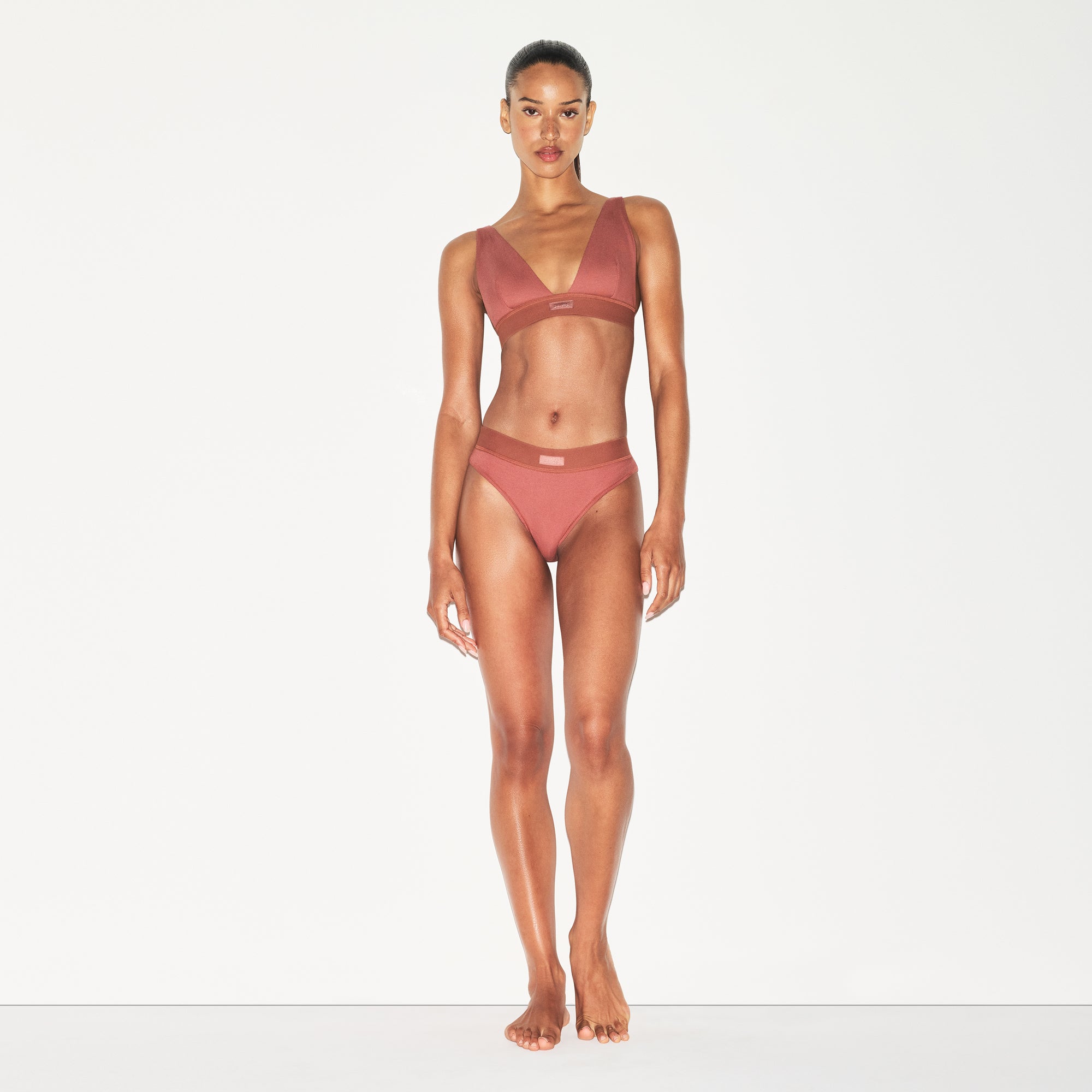 COTTON RIB PLUNGE BRALETTE | REDWOOD ON A MODEL FRONT VIEW | FOCUS: 0.0, 1.0, 0.9