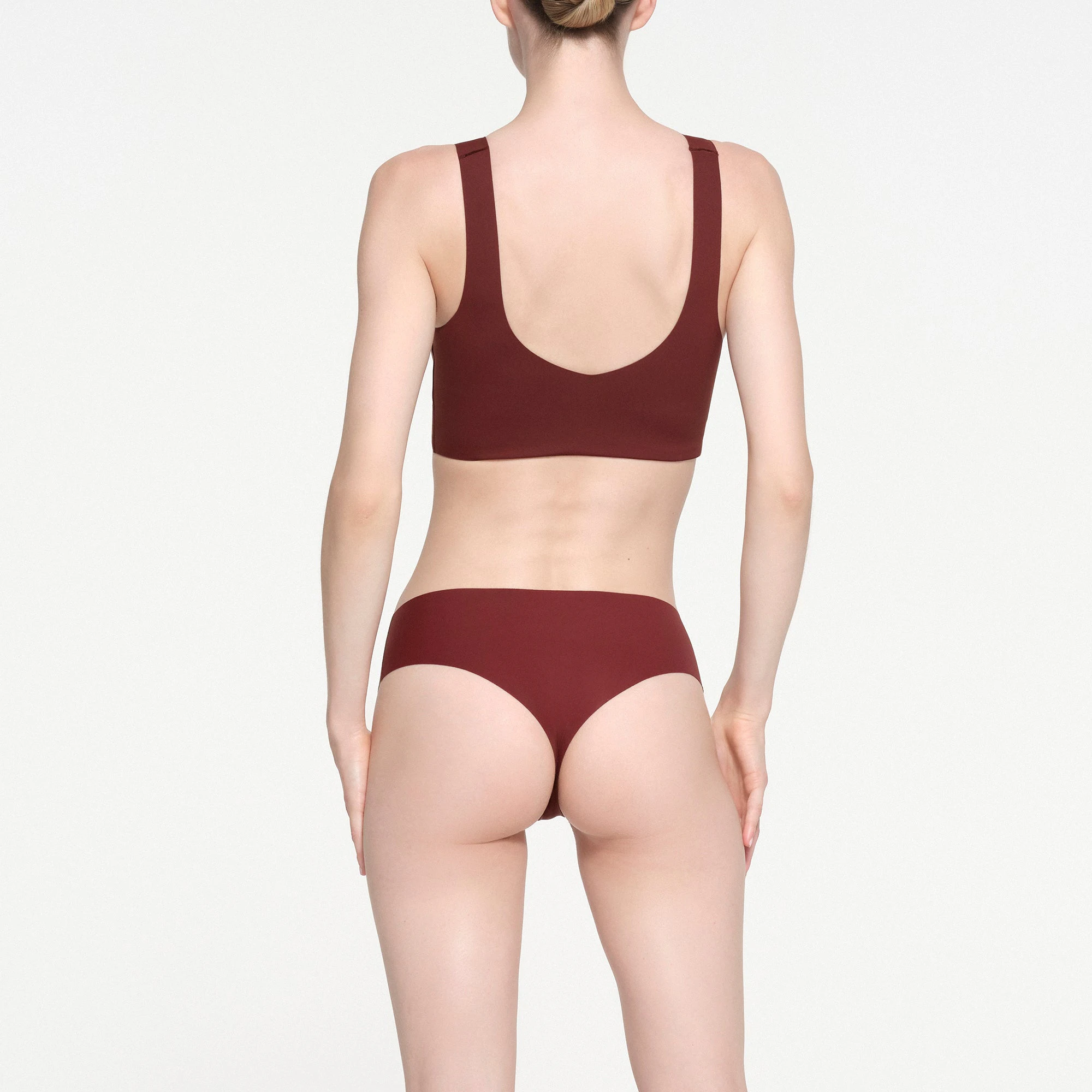 NAKED PLUNGE LONGLINE BRALETTE | OXBLOOD ON A MODEL BACK VIEW