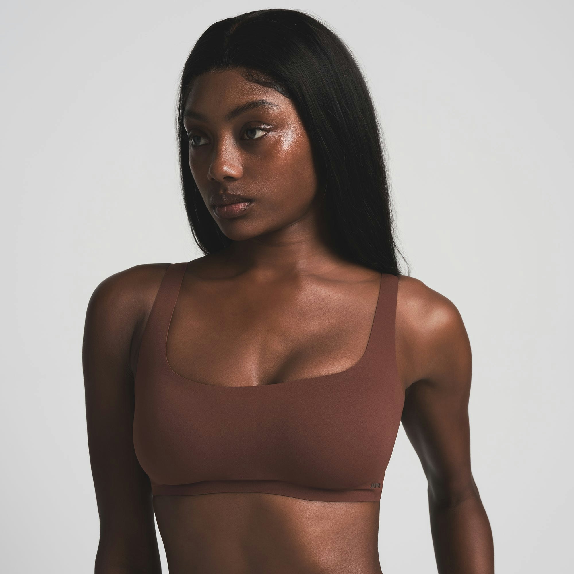 NAKED SCOOP BRA WORN BY A MODEL IN FRONT VIEW