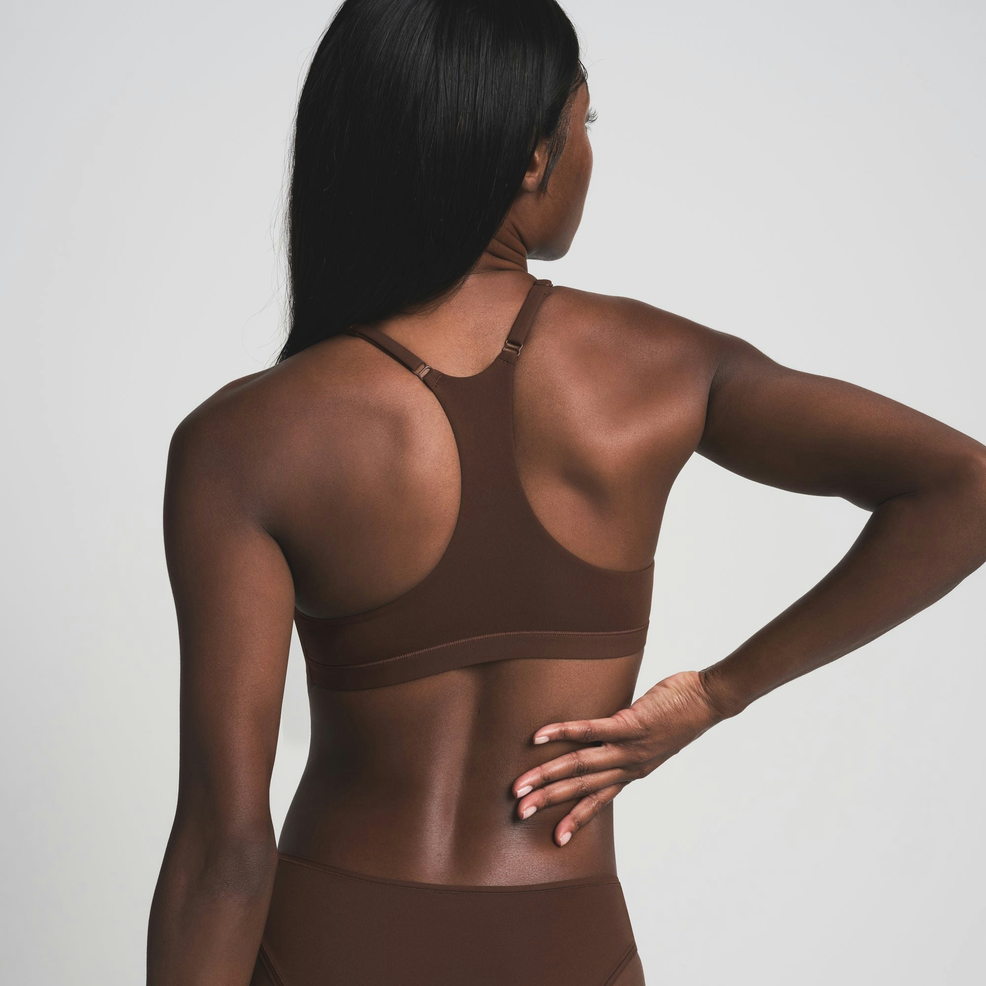 FITS EVERYBODY RACERBACK BRALETTE | COCOA ON A MODEL FRONT VIEW | FOCUS: 0.0, 1.0, 0.9