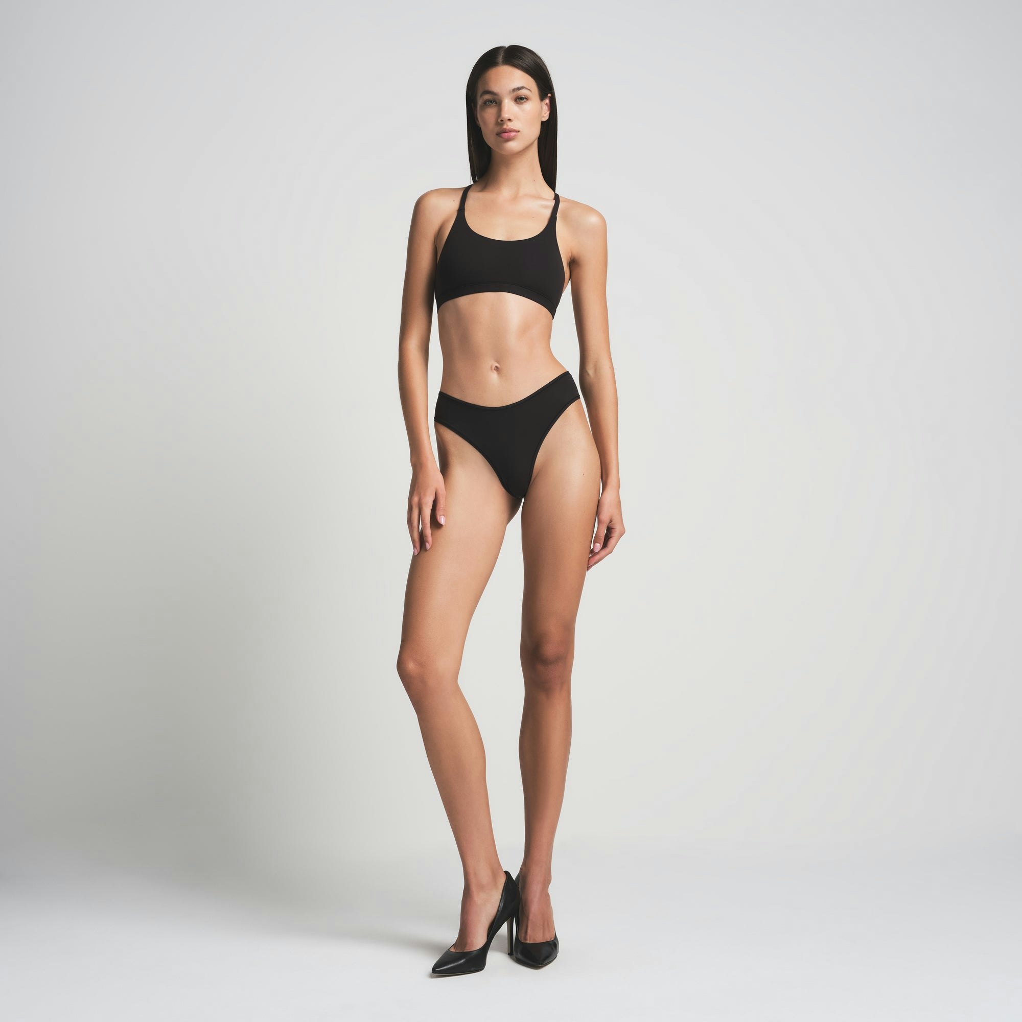FITS EVERYBODY RACERBACK BRALETTE | ONYX ON A MODEL FRONT VIEW | FOCUS: 0.0, 1.0, 0.9