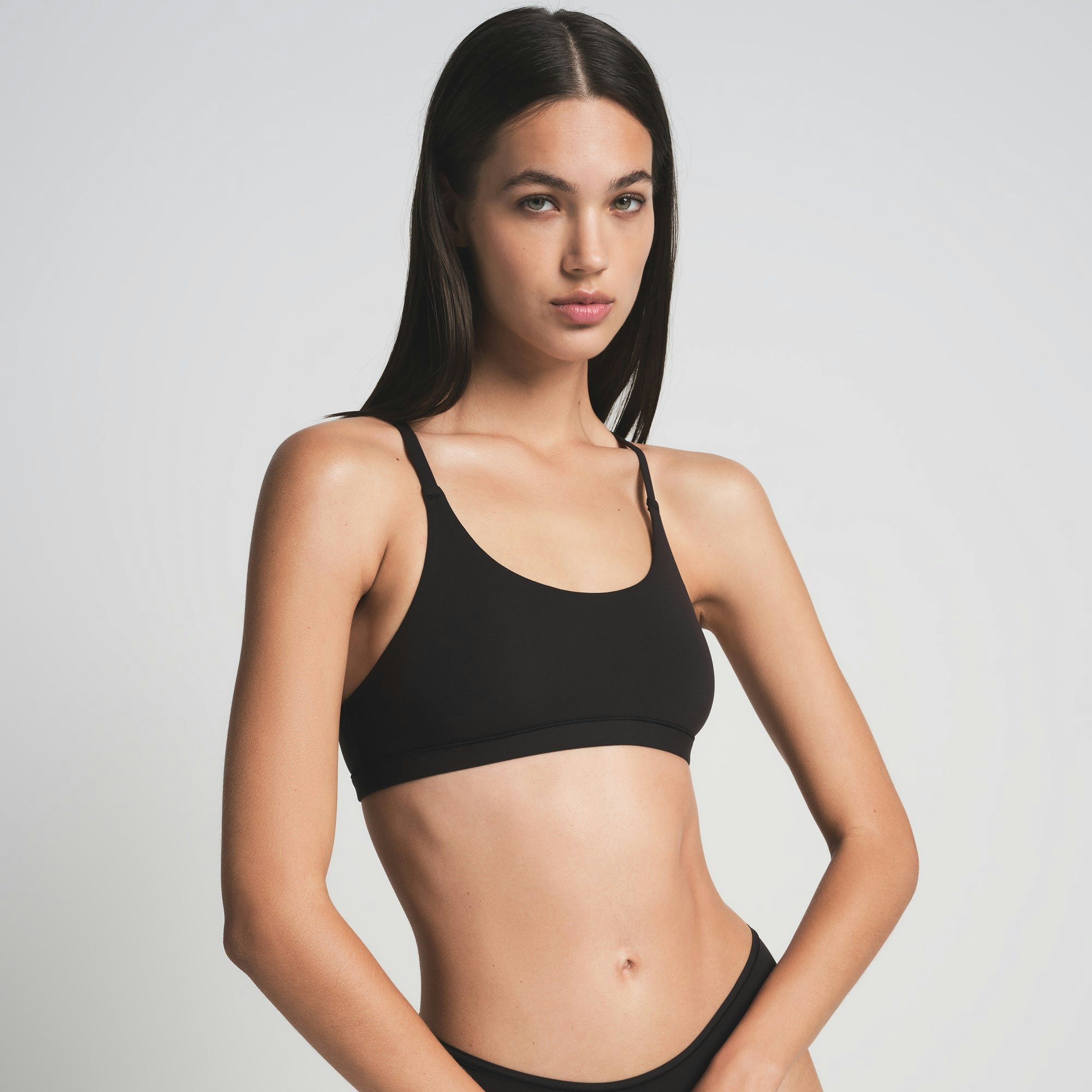 FITS EVERYBODY RACERBACK BRALETTE | ONYX ON A MODEL FRONT VIEW | FOCUS: 0.0, 1.0, 0.9