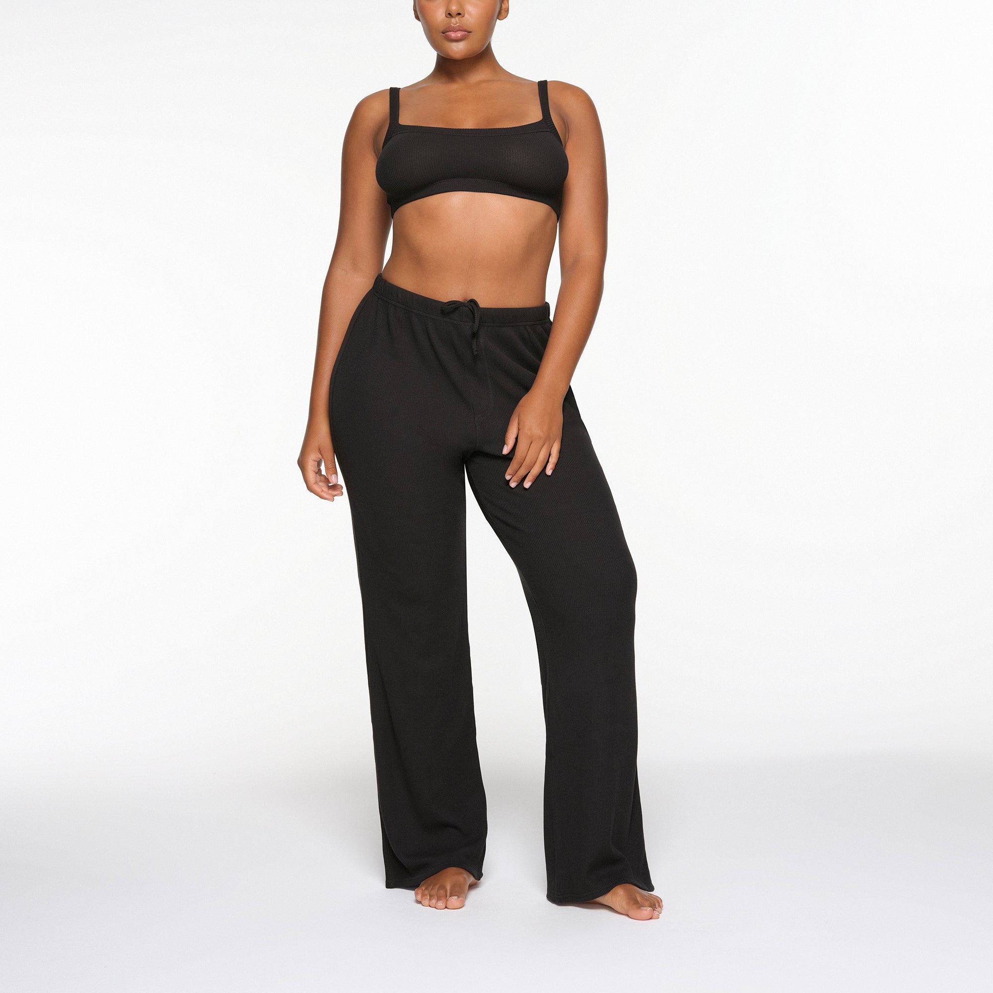 WAFFLE SCOOP BRALETTE WORN BY A MODEL IN FRONT VIEW