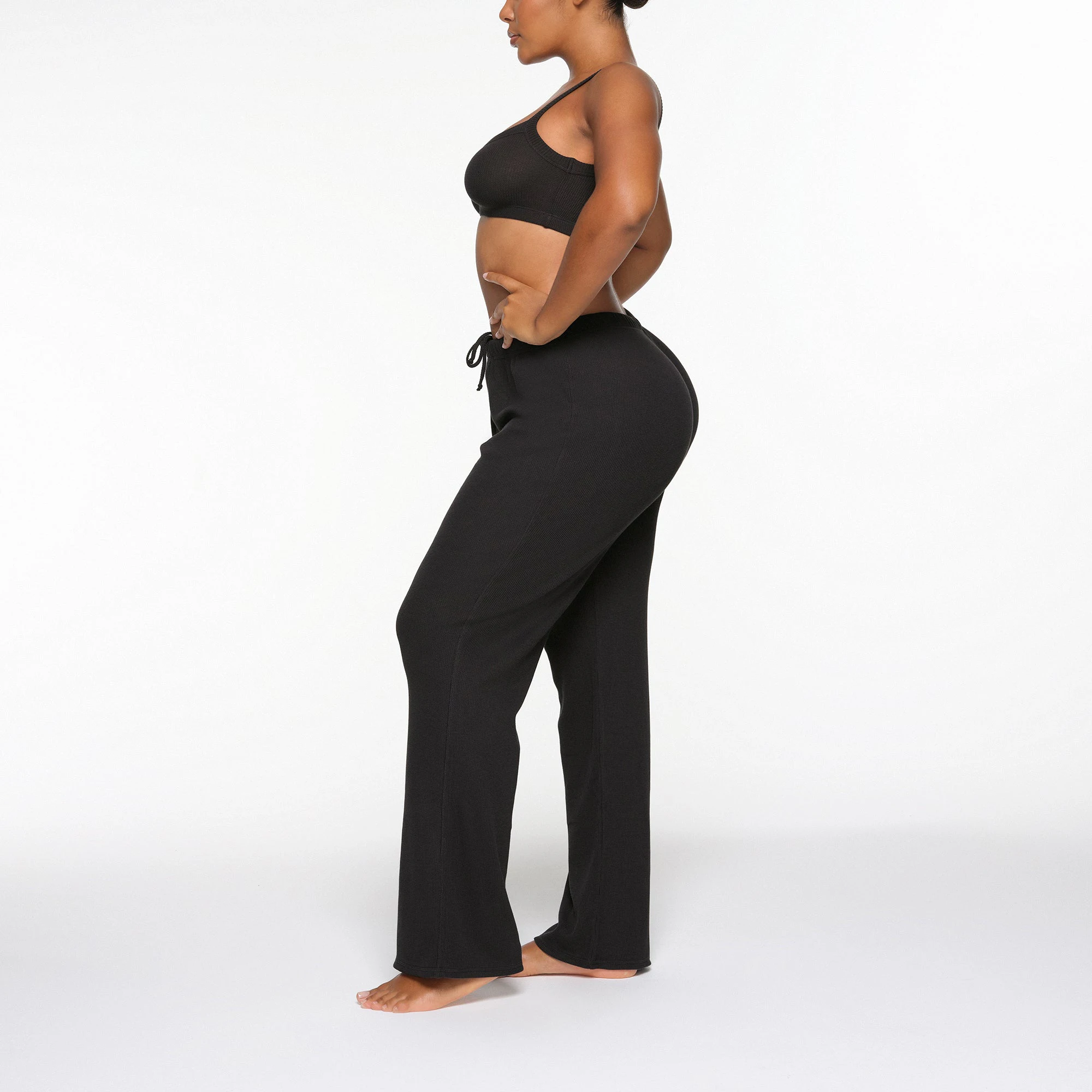 WAFFLE SCOOP BRALETTE WORN BY A MODEL IN SIDE VIEW