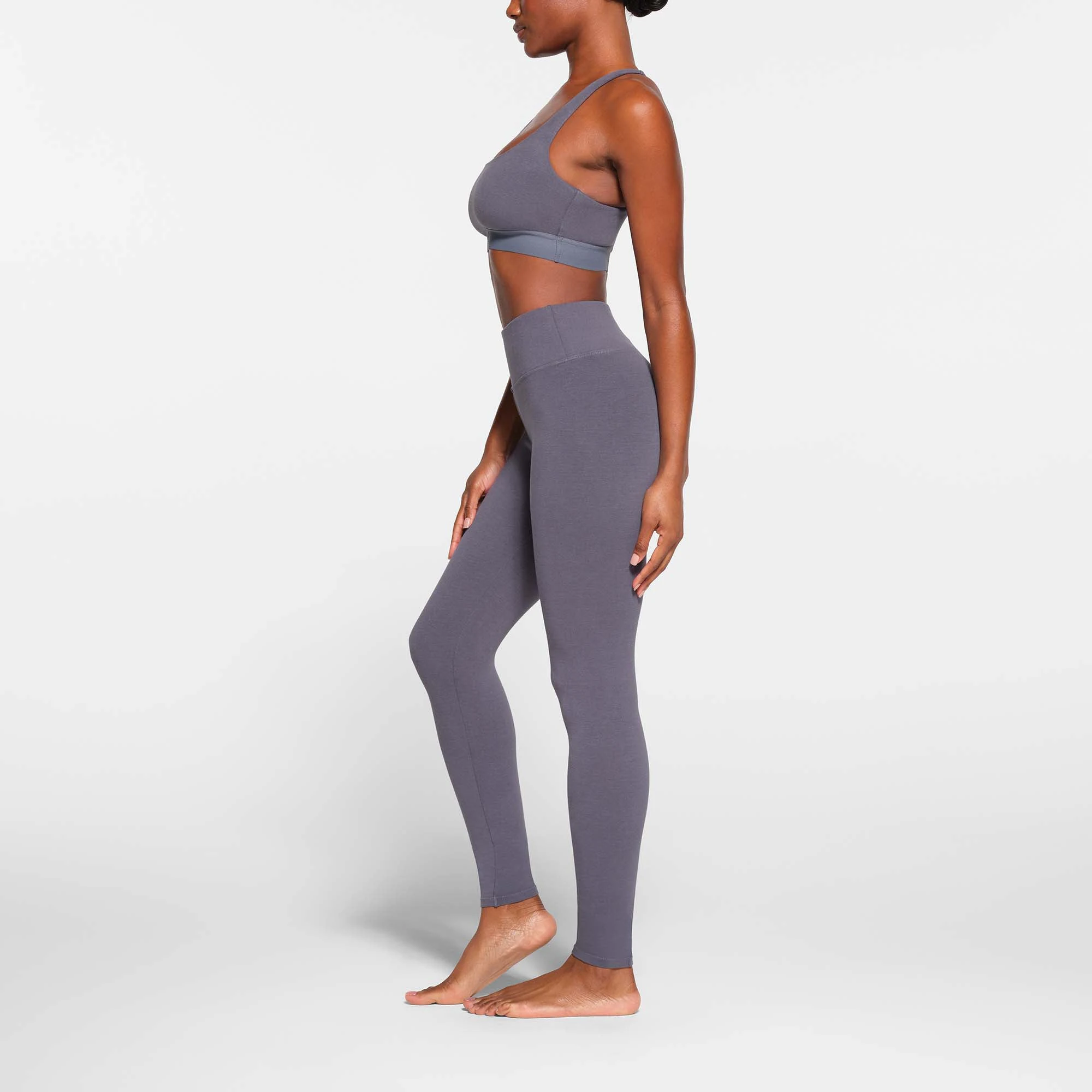 OUTDOOR RACERBACK BRALETTE | STEEL BLUE ON A MODEL SIDE VIEW