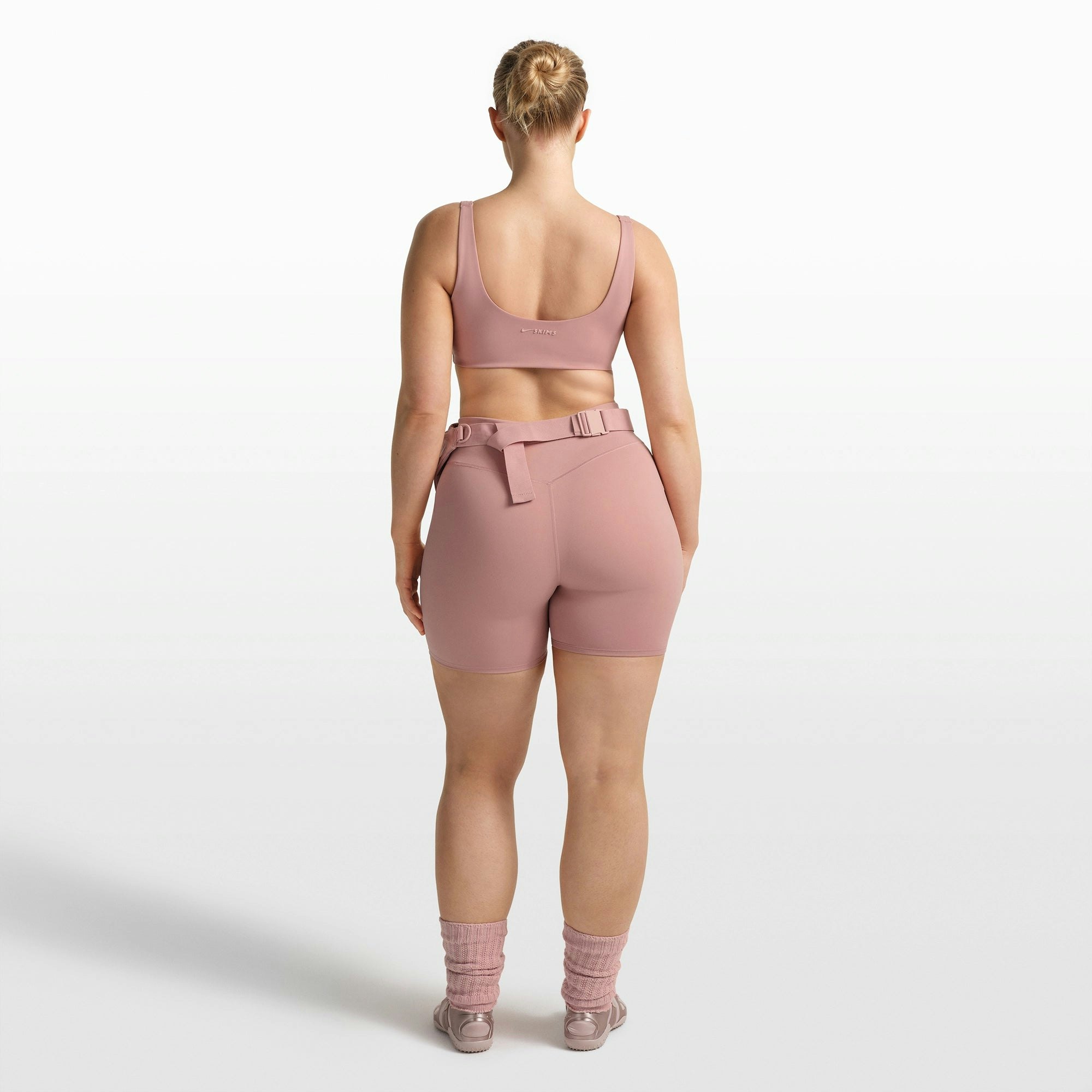 NikeSKIMS MATTE SCOOP NECK BRA | HIMALAYAN ON A MODEL FRONT VIEW @ | FOCUS: 0.0, 1.0, 0.9