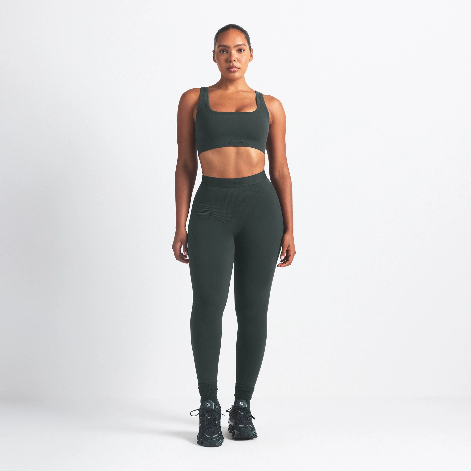 NikeSKIMS VINTAGE SEAMLESS SCOOP NECK BRA | DARK TEAL ON A MODEL FRONT VIEW @ | FOCUS: 0.0, 1.0, 0.9