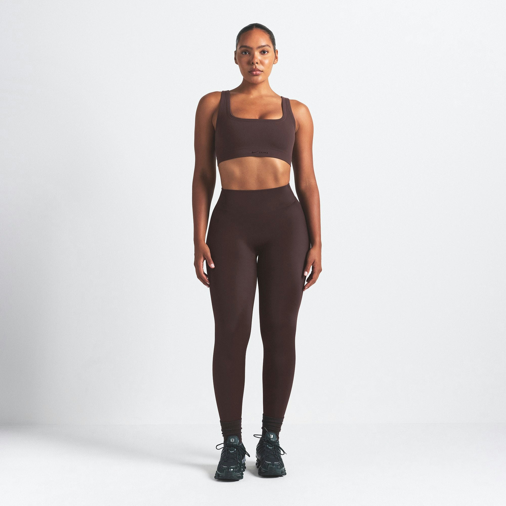 NikeSKIMS VINTAGE SEAMLESS SCOOP NECK BRA | PHOENIX ON A MODEL FRONT VIEW @ | FOCUS: 0.9, 0.1, 0.7