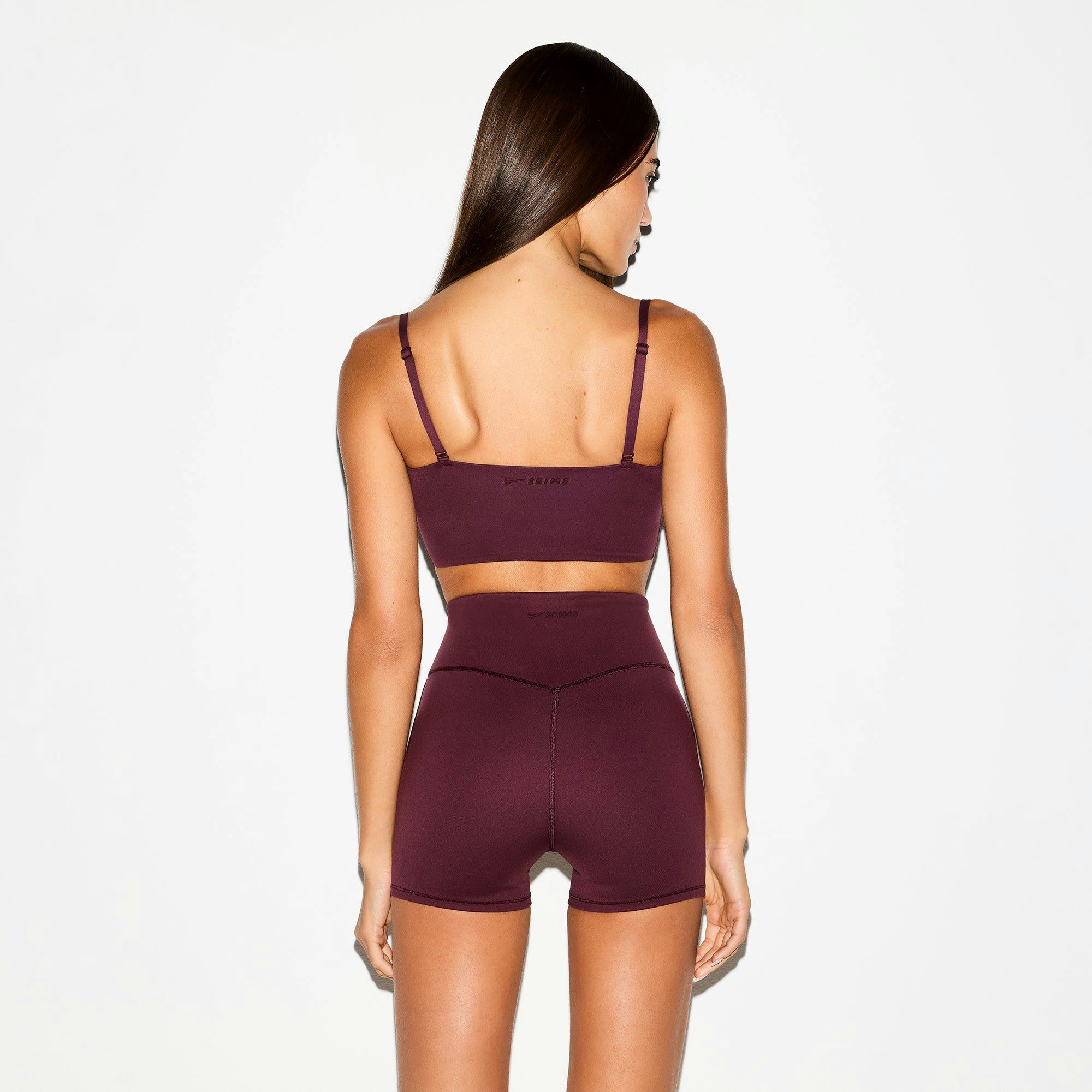 NikeSKIMS MATTE CAMI BRA TOP | CURRANT ON A MODEL BACK VIEW @ | FOCUS: 0.0, 1.0, 0.9