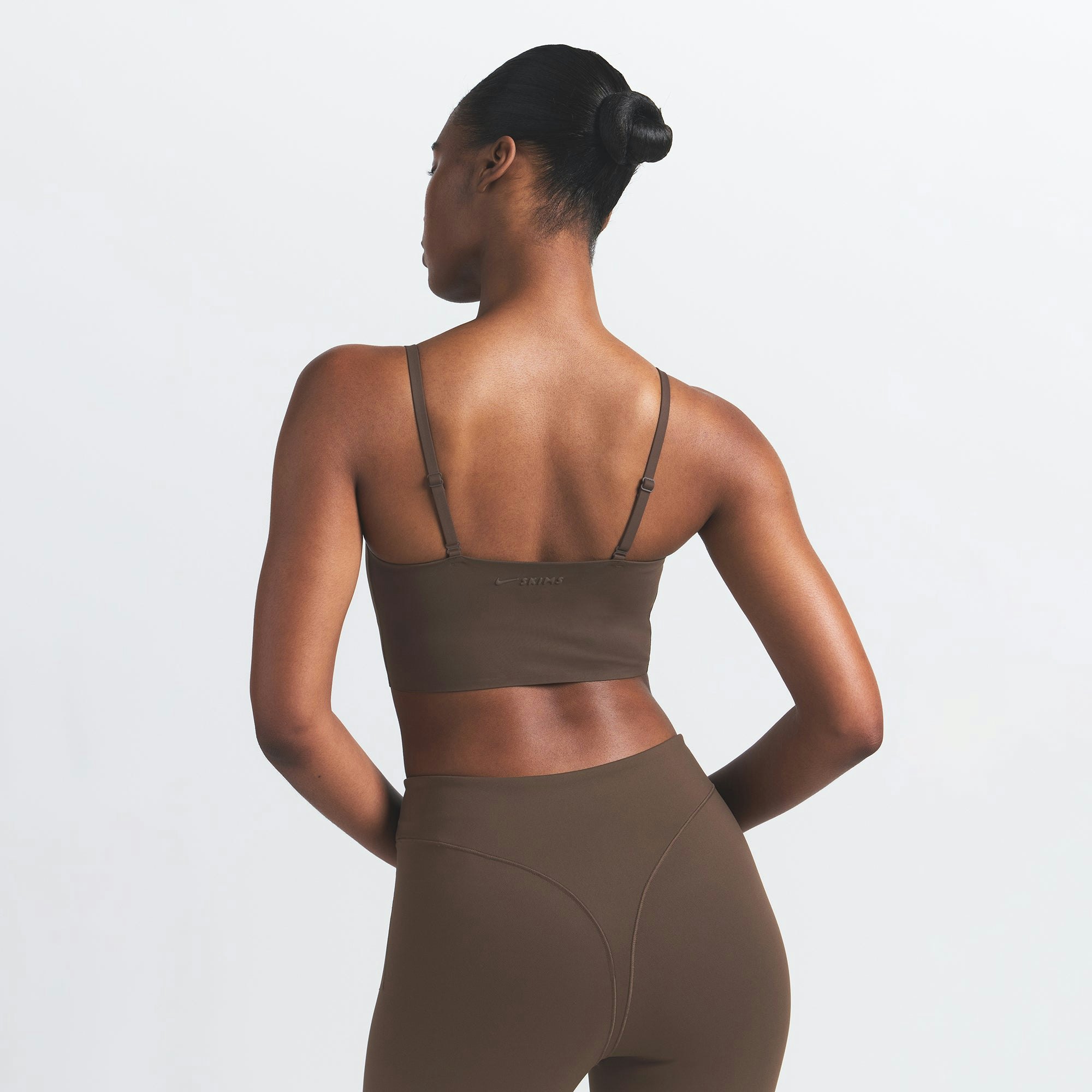 NikeSKIMS MATTE CAMI BRA TOP | DARK SEPIA ON A MODEL BACK VIEW