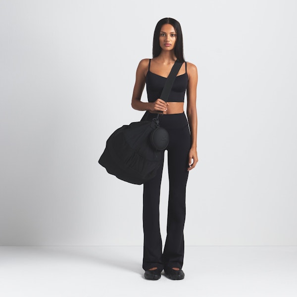 NikeSKIMS MATTE CAMI BRA TOP | OBSIDIAN ON A MODEL FRONT VIEW