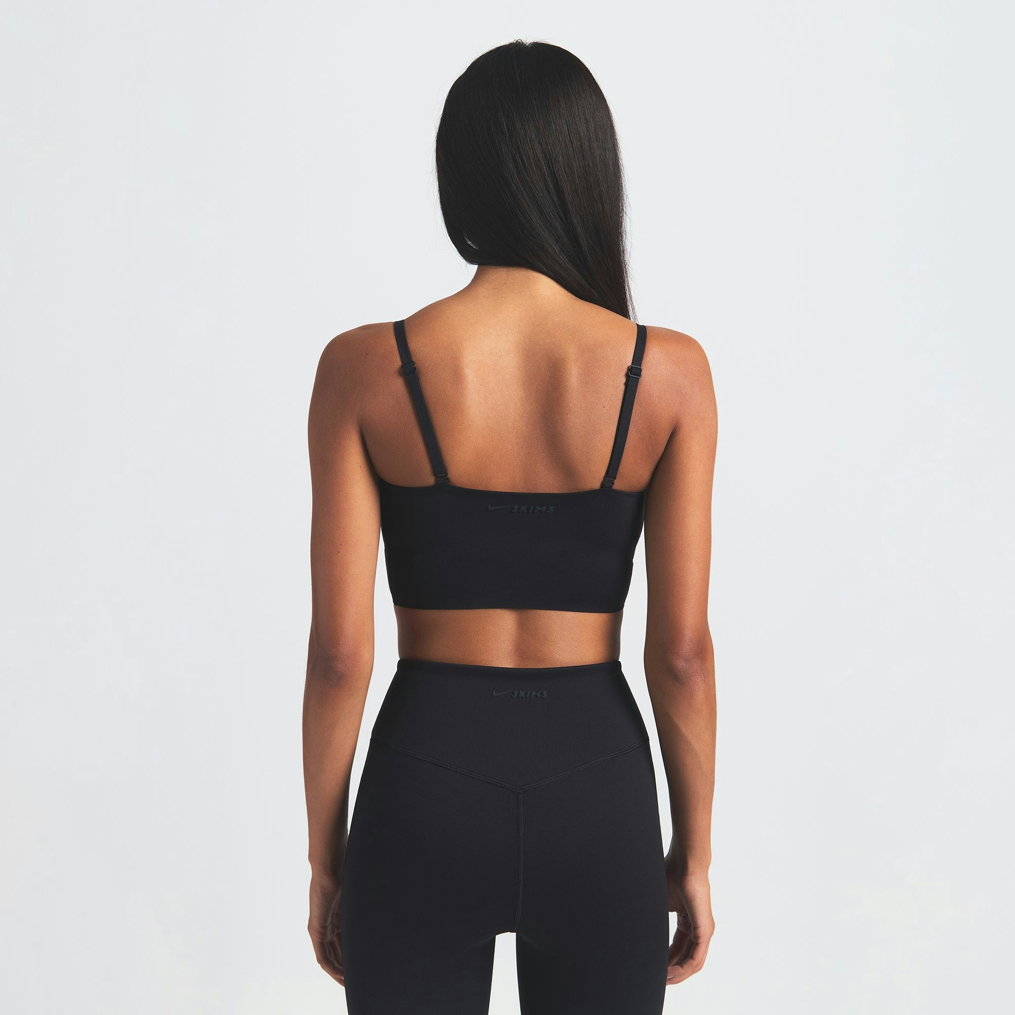 NikeSKIMS MATTE CAMI BRA TOP | OBSIDIAN ON A MODEL BACK VIEW