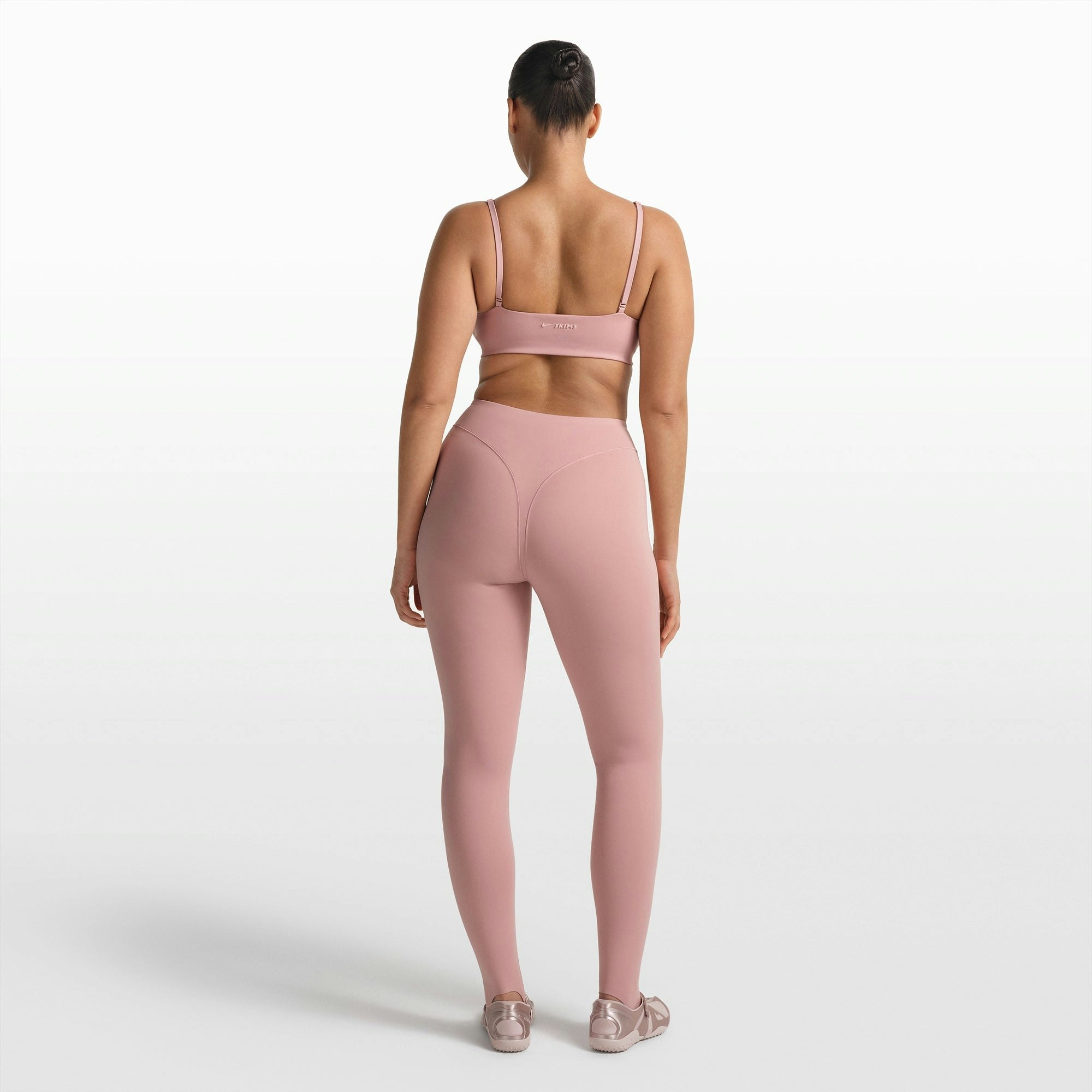 NikeSKIMS MATTE MICRO SCOOP BRA | HIMALAYAN ON A MODEL FRONT VIEW @ | FOCUS: 0.0, 1.0, 0.9