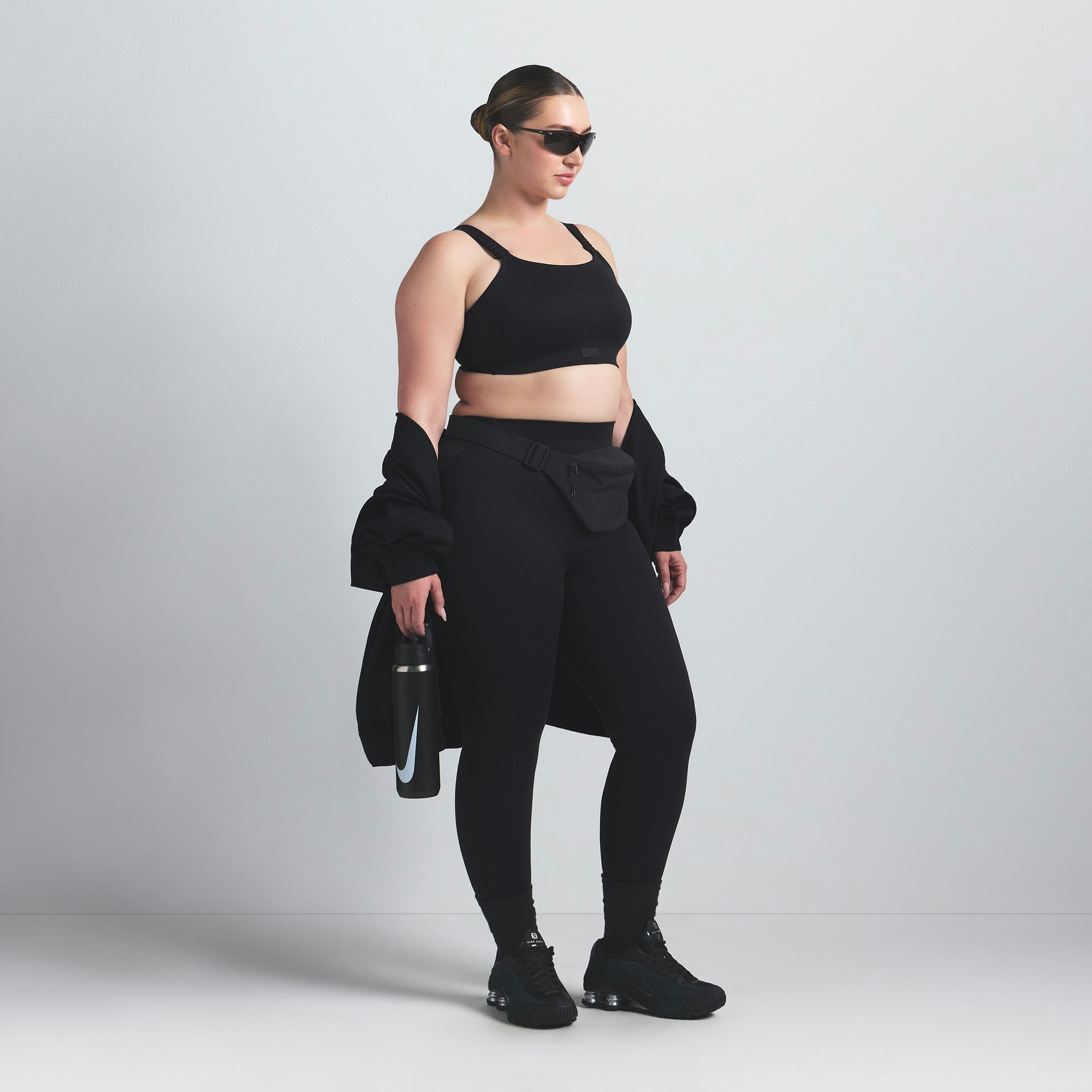 NikeSKIMS MATTE WIDE STRAP BRA | OBSIDIAN ON A MODEL SIDE VIEW