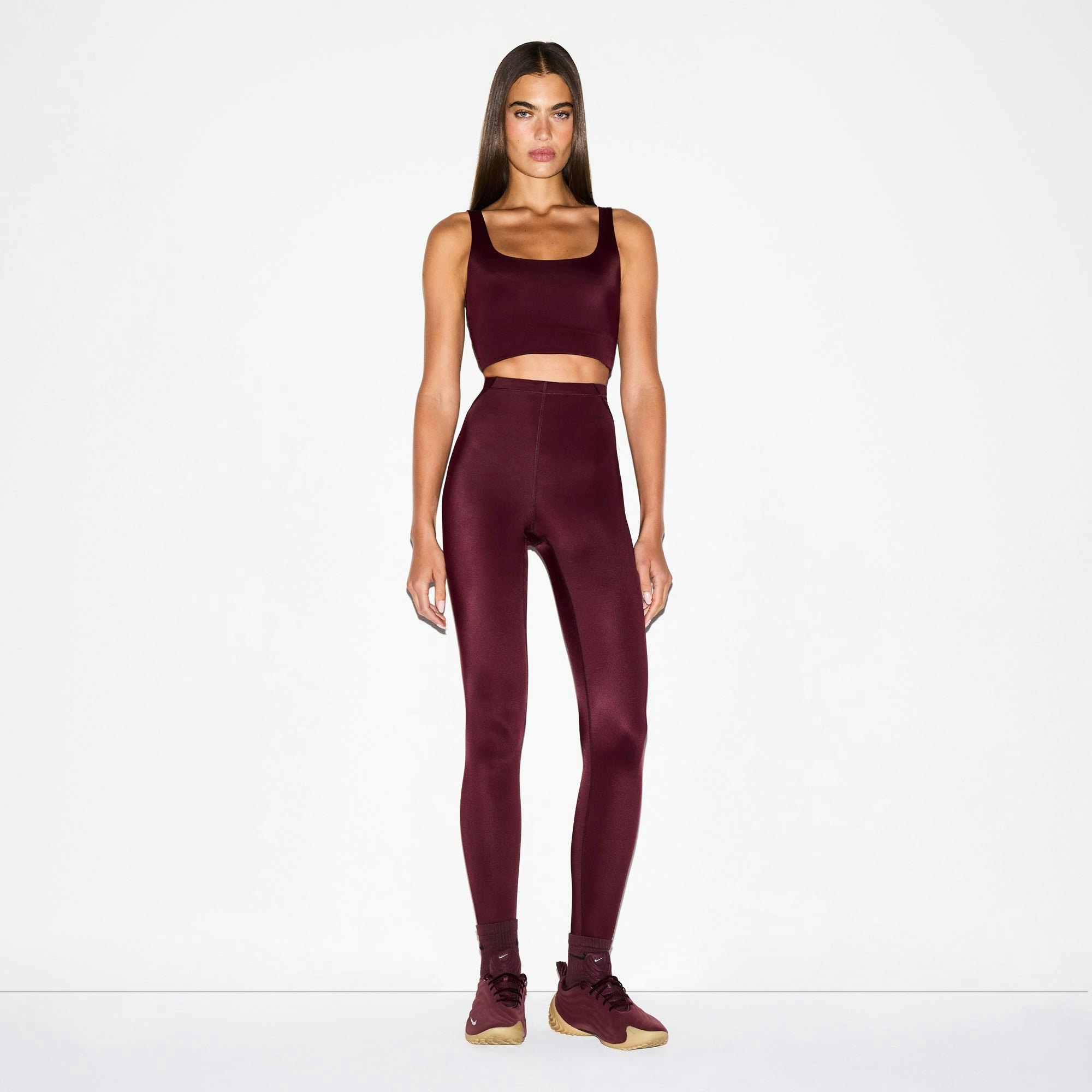 NikeSKIMS SHINE SCOOP NECK BRA TOP | CURRANT ON A MODEL FRONT VIEW @ | FOCUS: 0.0, 1.0, 0.9