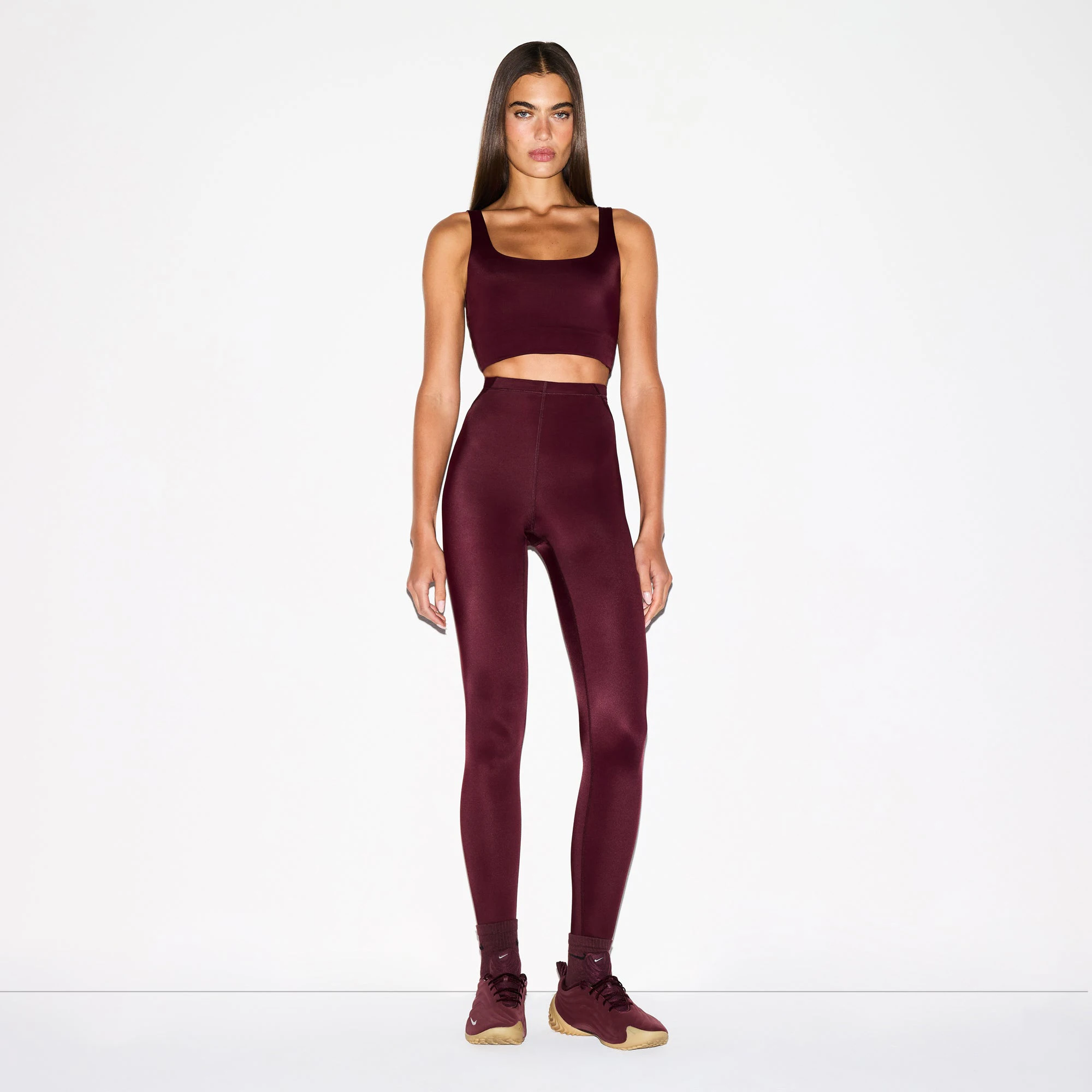 NikeSKIMS SHINE SCOOP NECK BRA TOP | CURRANT ON A MODEL FRONT VIEW @ | FOCUS: 0.0, 1.0, 0.9