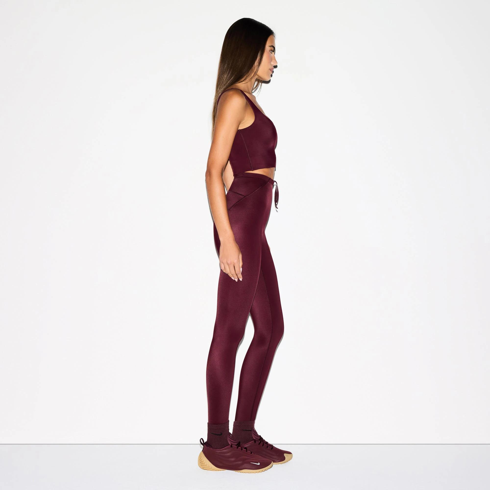 NikeSKIMS SHINE SCOOP NECK BRA TOP | CURRANT ON A MODEL FRONT VIEW @ | FOCUS: 0.0, 1.0, 0.9