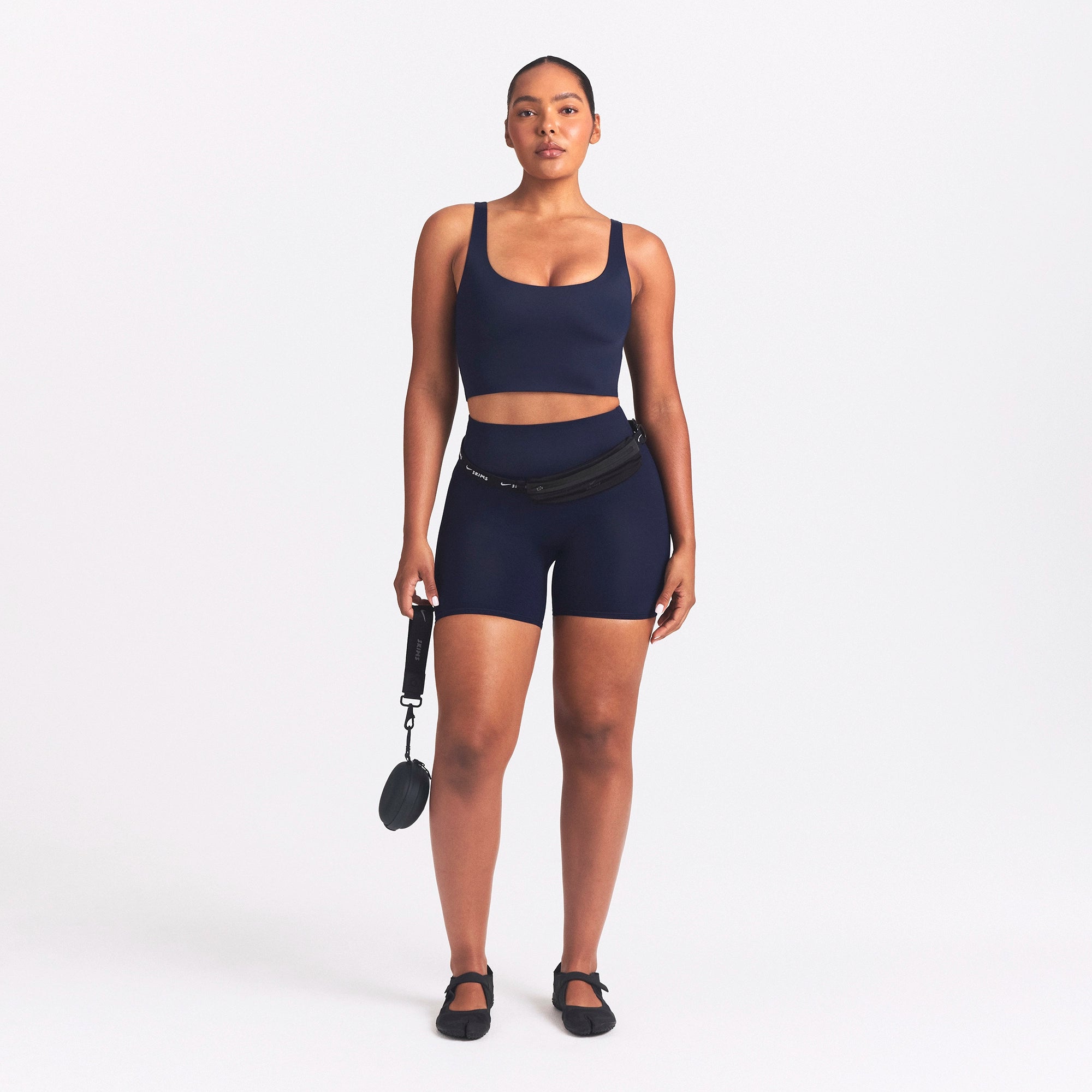 NikeSKIMS SHINE SCOOP NECK BRA TOP | NAVY ON A MODEL FRONT VIEW @ | FOCUS: 0.0, 1.0, 0.9