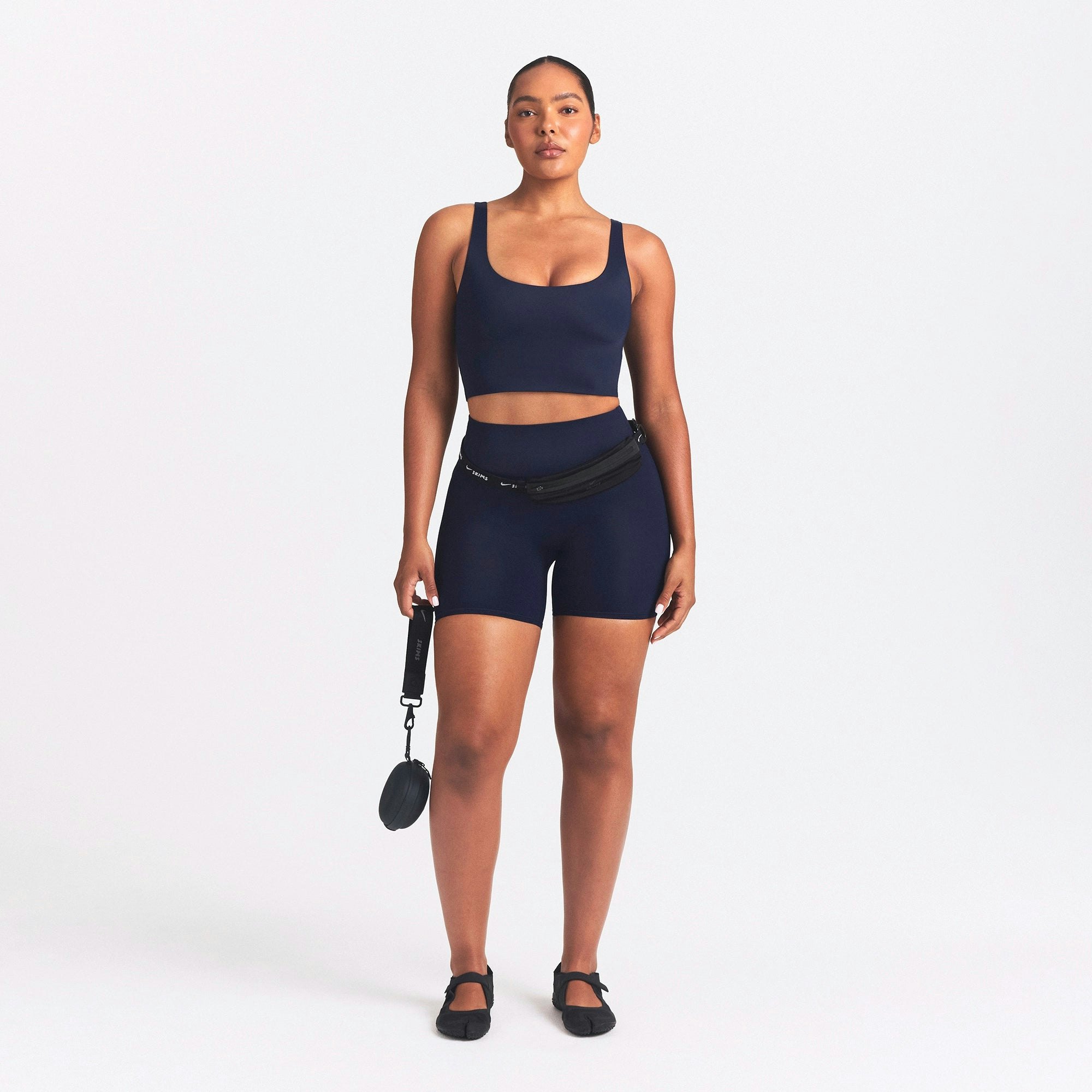NikeSKIMS SHINE SCOOP NECK BRA TOP | NAVY ON A MODEL FRONT VIEW @ | FOCUS: 0.0, 1.0, 0.9