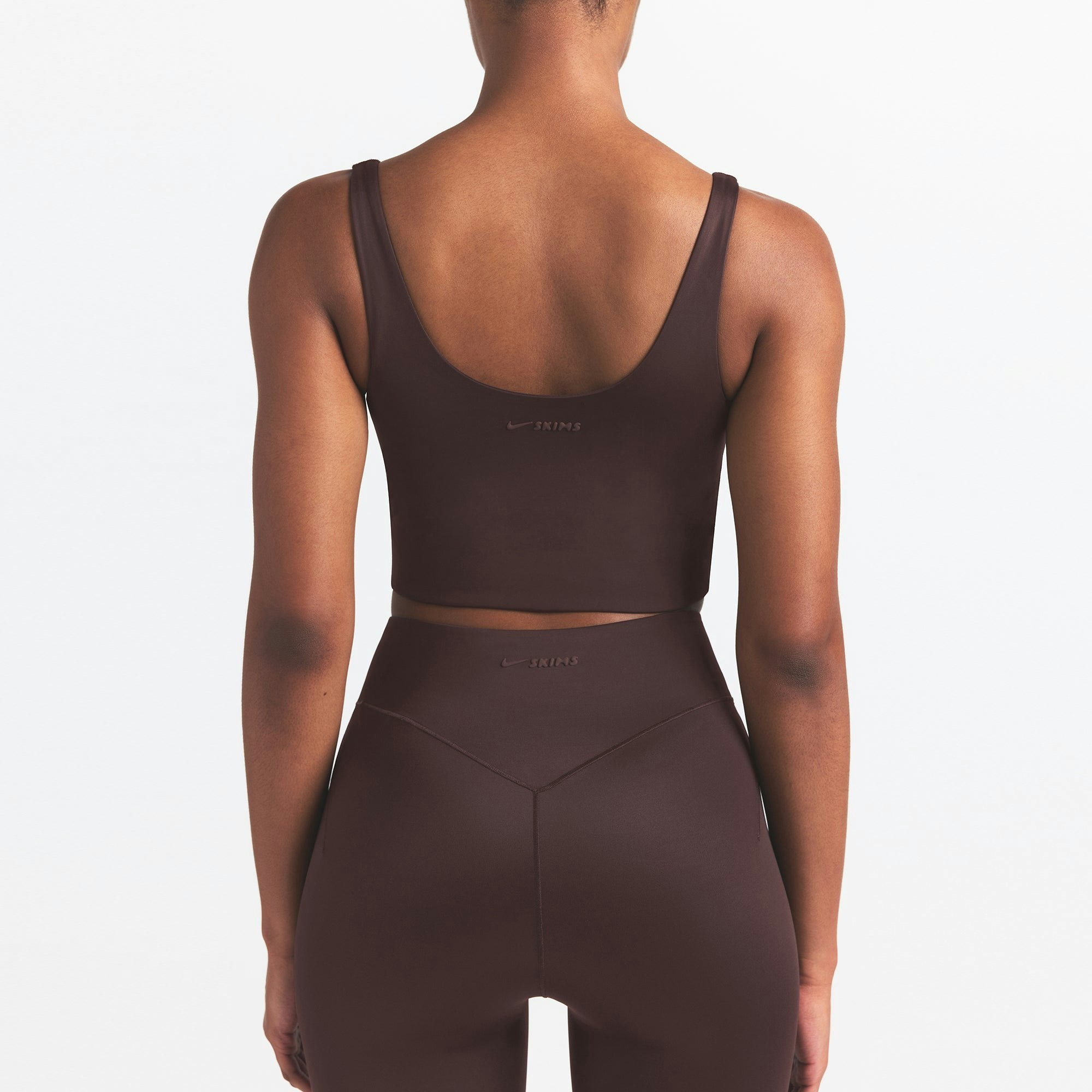 NikeSKIMS SHINE SCOOP NECK BRA TOP | PHOENIX ON A MODEL SIDE VIEW