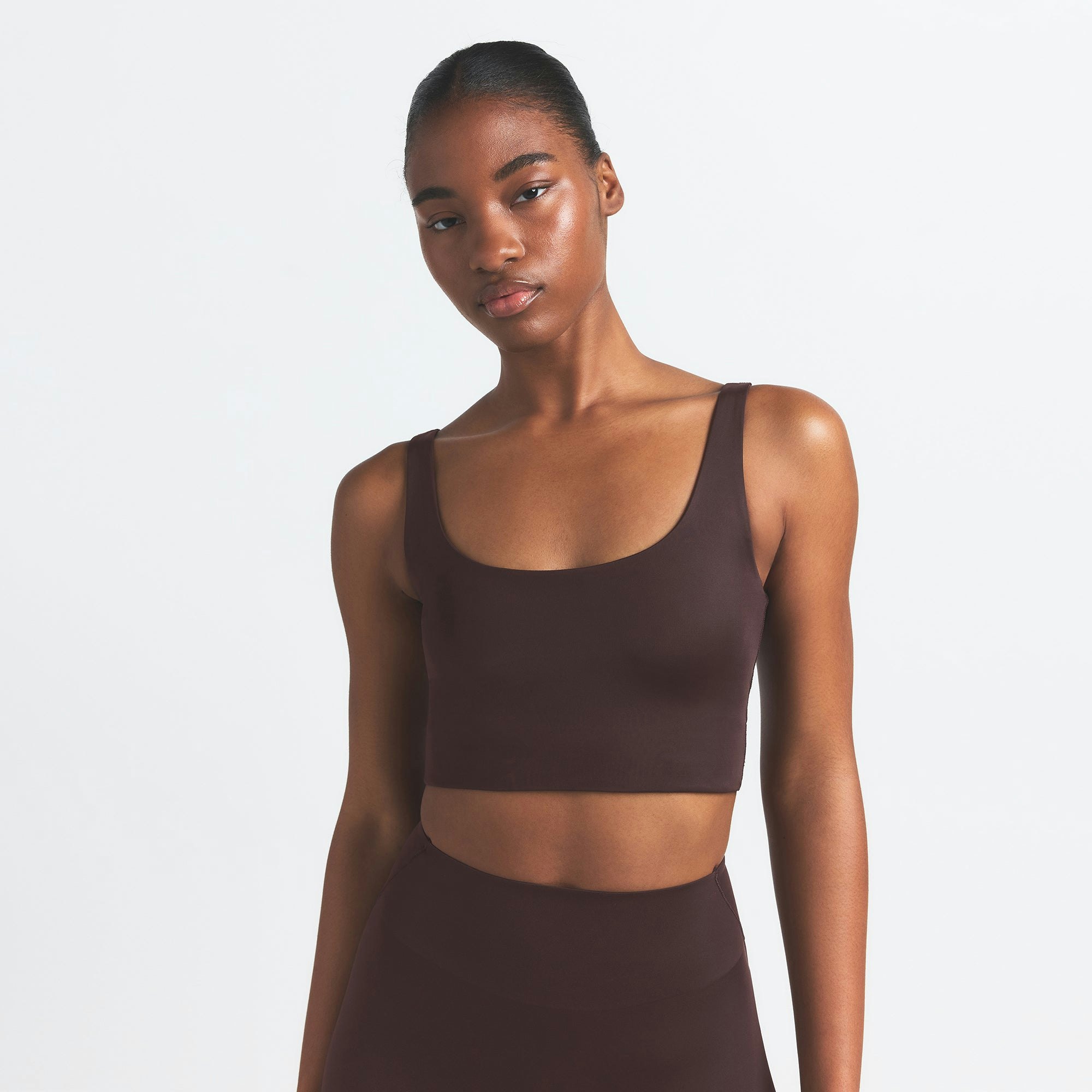 NikeSKIMS SHINE SCOOP NECK BRA TOP | PHOENIX ON A MODEL SIDE VIEW