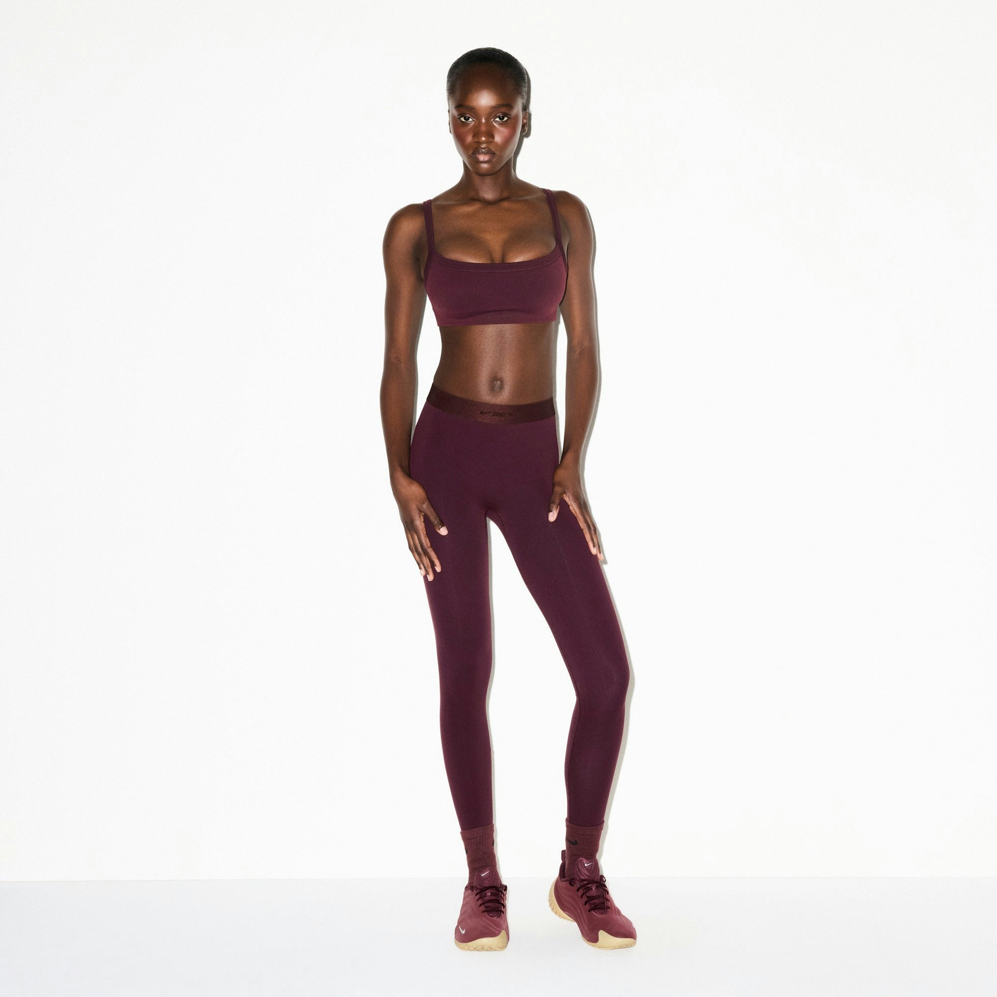NikeSKIMS VINTAGE SEAMLESS CAMI BRA | CURRANT ON A MODEL FRONT VIEW @ | FOCUS: 0.0, 1.0, 0.9