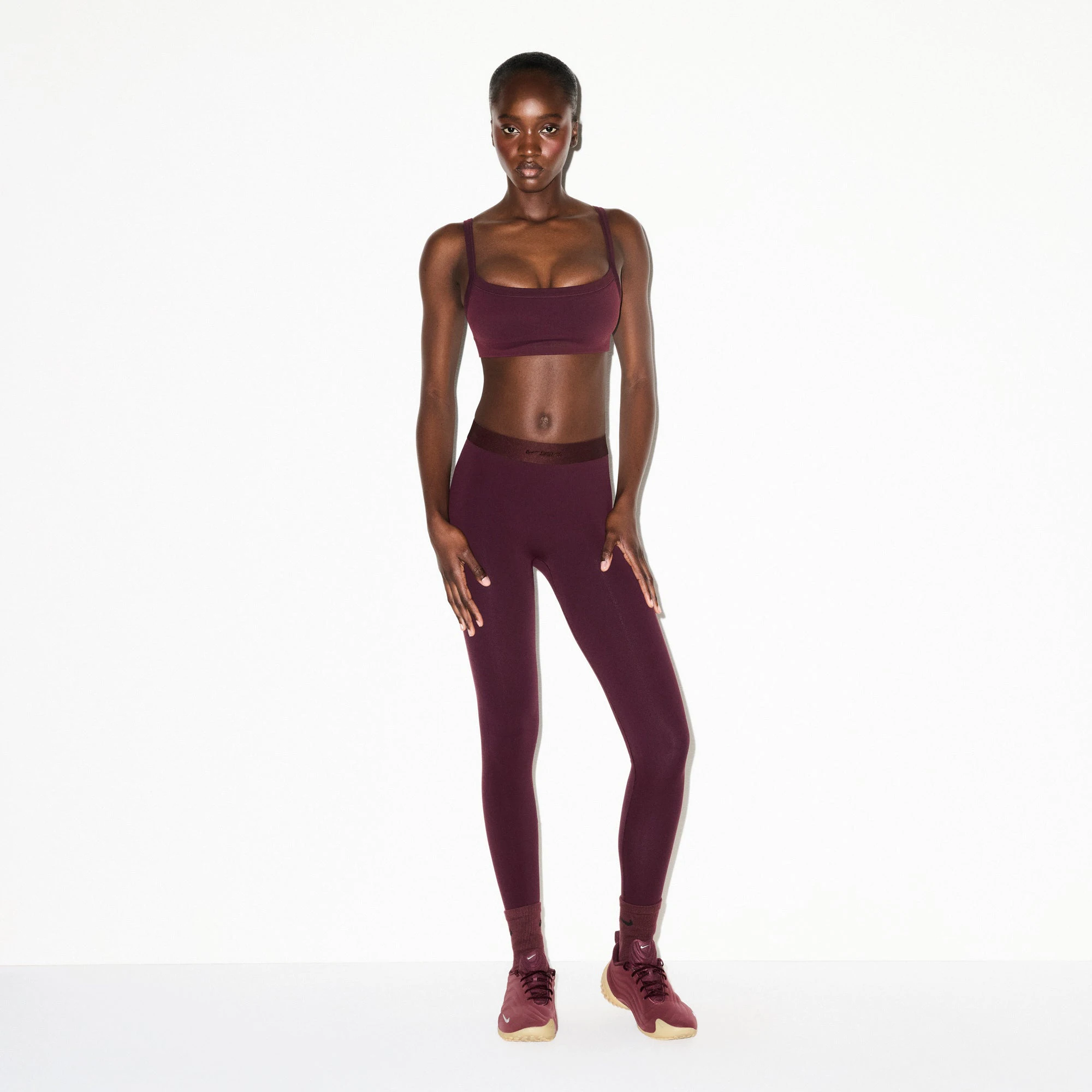 NikeSKIMS VINTAGE SEAMLESS CAMI BRA | CURRANT ON A MODEL FRONT VIEW @ | FOCUS: 0.0, 1.0, 0.9