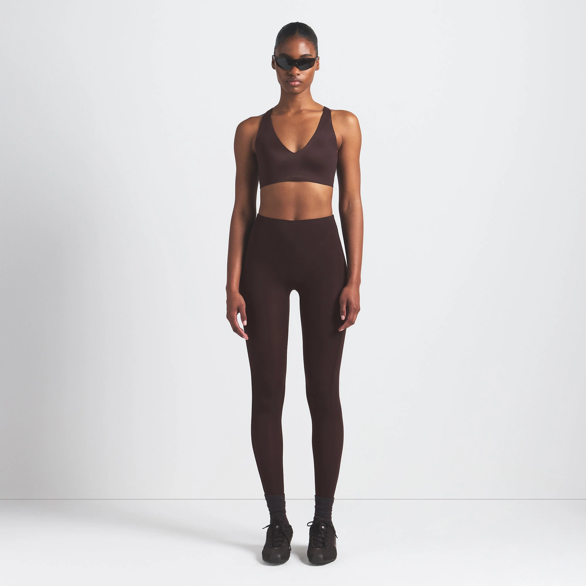 NikeSKIMS SHINE V-NECK BRA | PHOENIX ON A MODEL FRONT VIEW @ | FOCUS: 0.9, 0.1, 0.7