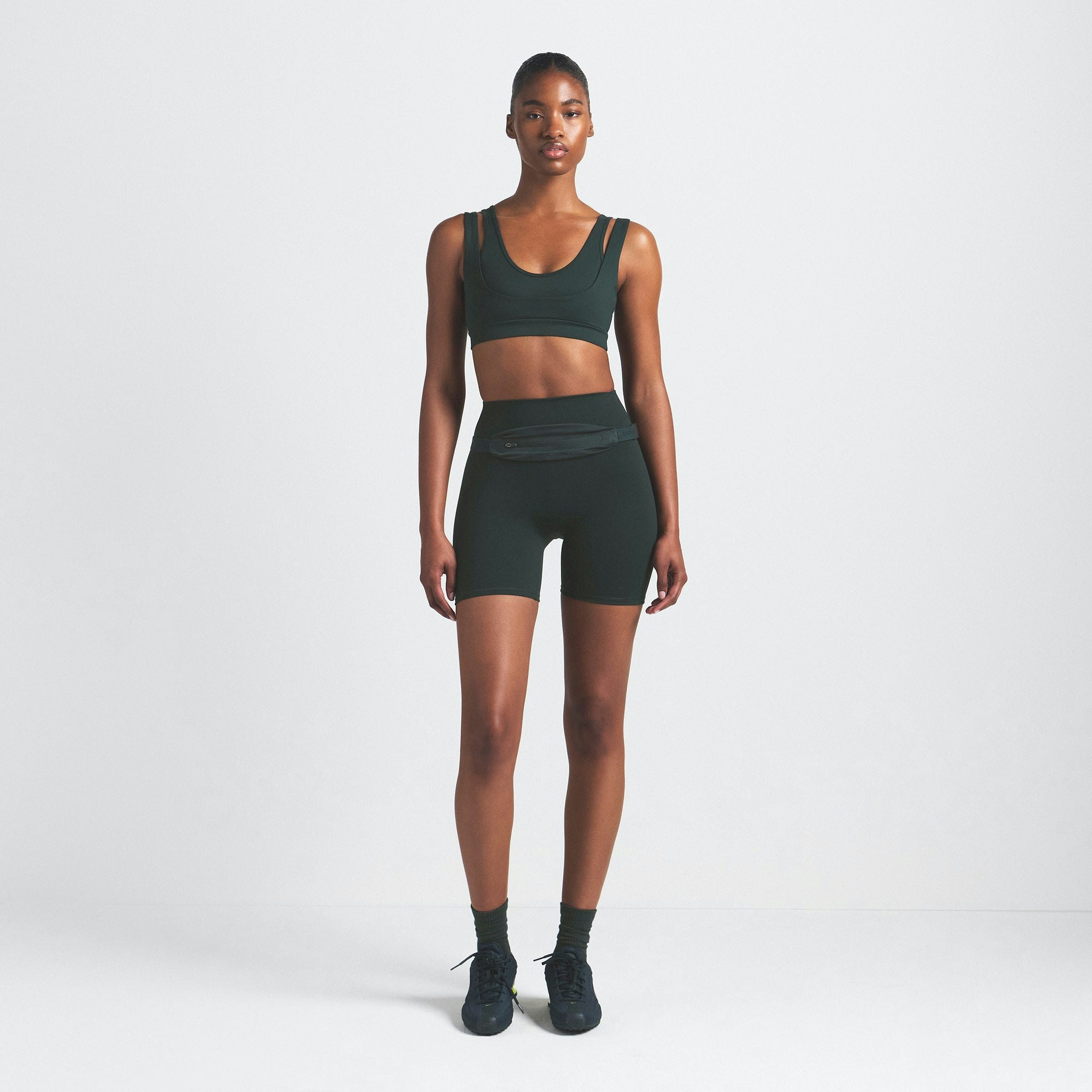 NikeSKIMS MATTE DOUBLE STRAP SCOOP BRA | DARK TEAL ON A MODEL FRONT VIEW @ | FOCUS: 0.0, 1.0, 0.9