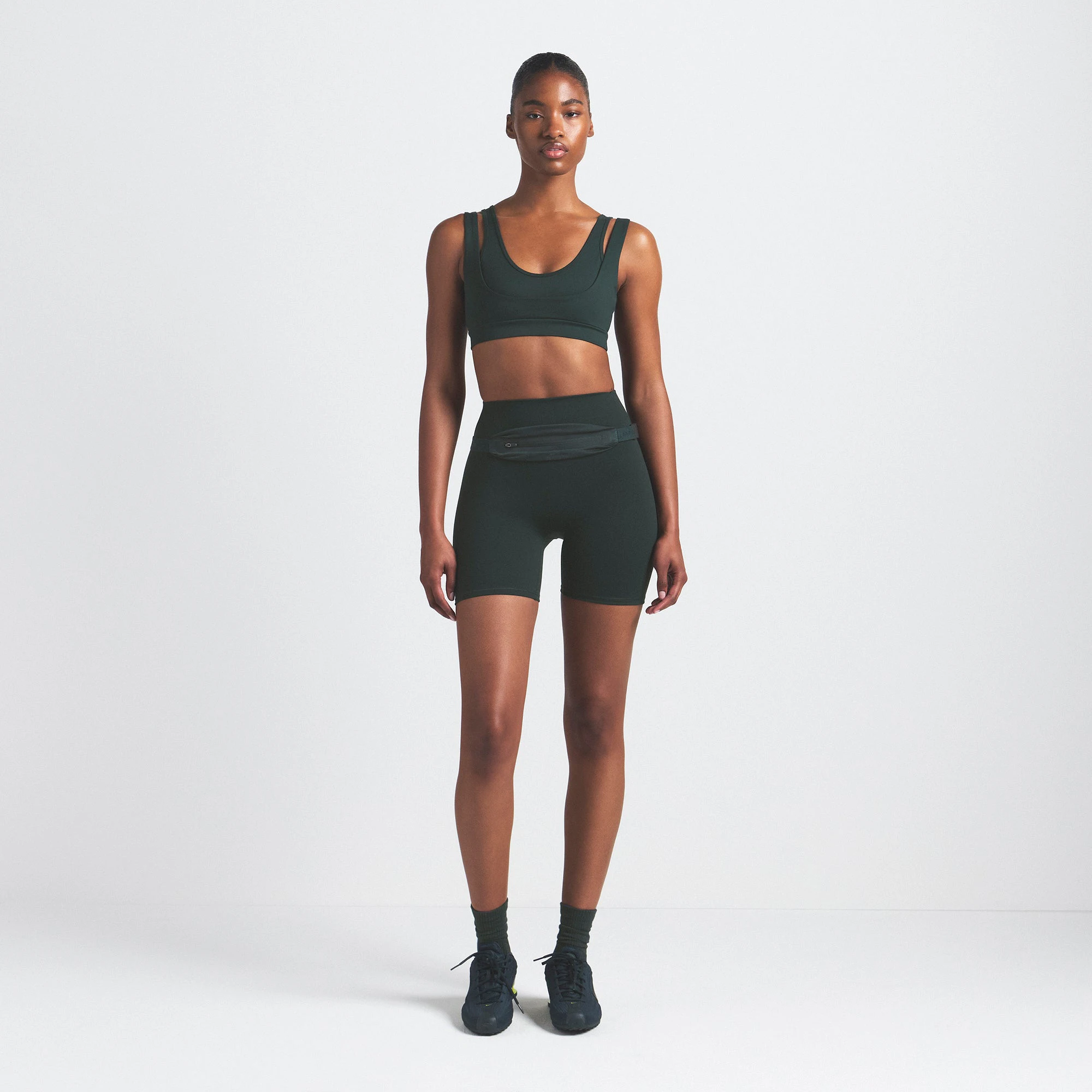 NikeSKIMS MATTE DOUBLE STRAP SCOOP BRA | DARK TEAL ON A MODEL FRONT VIEW @ | FOCUS: 0.0, 1.0, 0.9