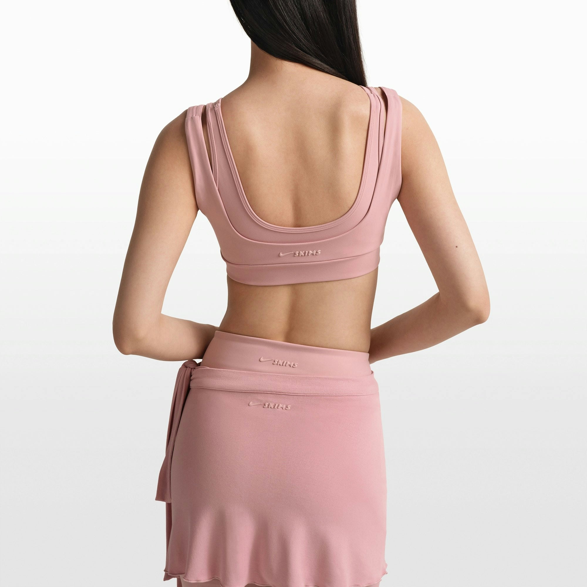 NikeSKIMS MATTE DOUBLE STRAP SCOOP BRA | HIMALAYAN ON A MODEL FRONT VIEW @ | FOCUS: 0.0, 1.0, 0.9