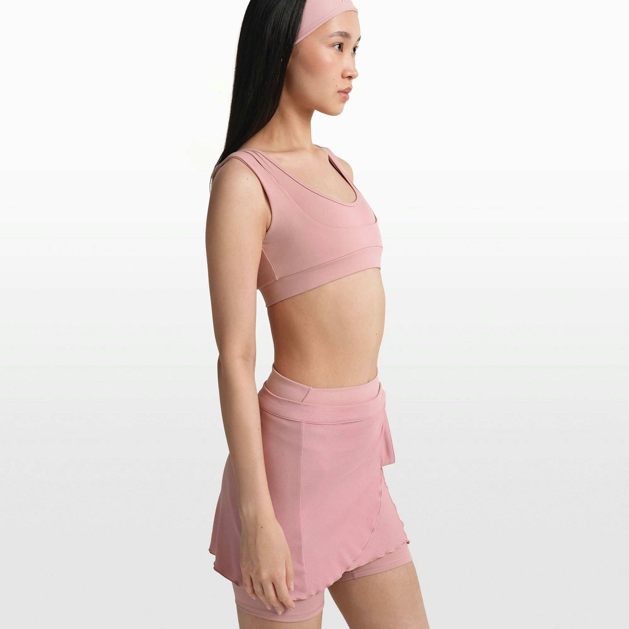 NikeSKIMS MATTE DOUBLE STRAP SCOOP BRA | HIMALAYAN ON A MODEL FRONT VIEW @ | FOCUS: 0.0, 1.0, 0.9