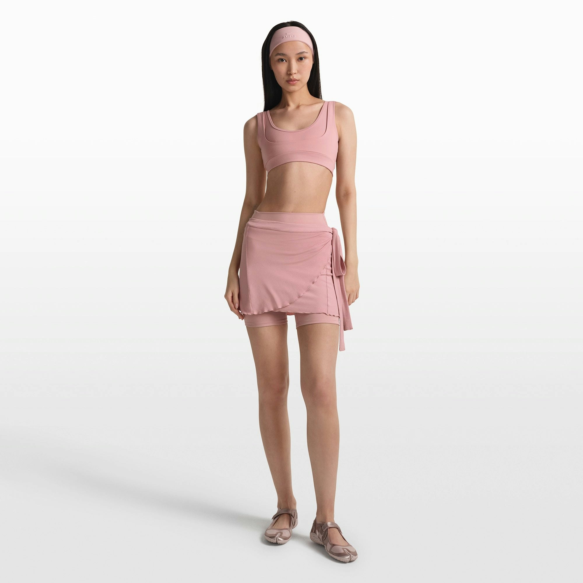 NikeSKIMS MATTE DOUBLE STRAP SCOOP BRA | HIMALAYAN ON A MODEL FRONT VIEW @ | FOCUS: 0.0, 1.0, 0.9