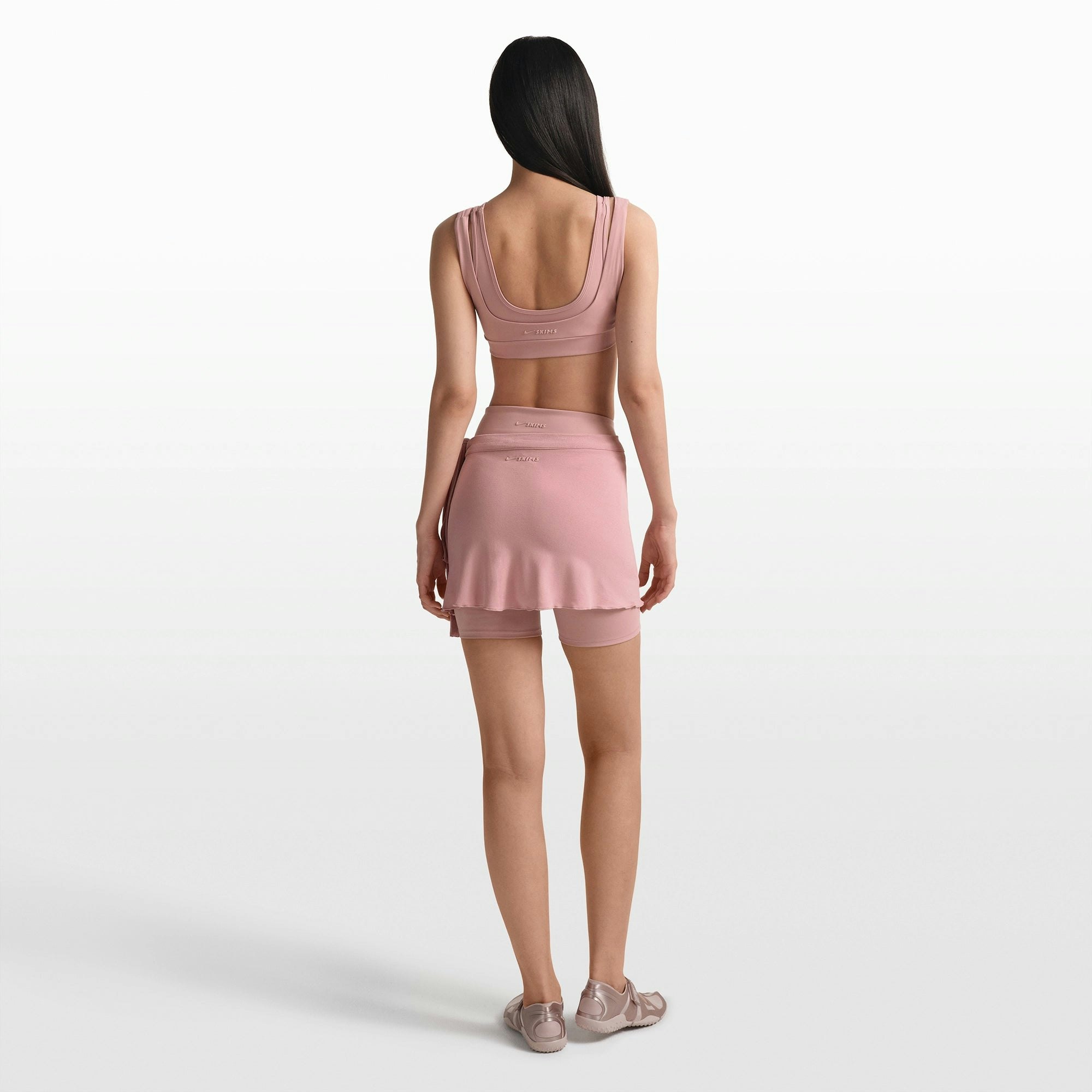 NikeSKIMS MATTE DOUBLE STRAP SCOOP BRA | HIMALAYAN ON A MODEL FRONT VIEW @ | FOCUS: 0.0, 1.0, 0.9