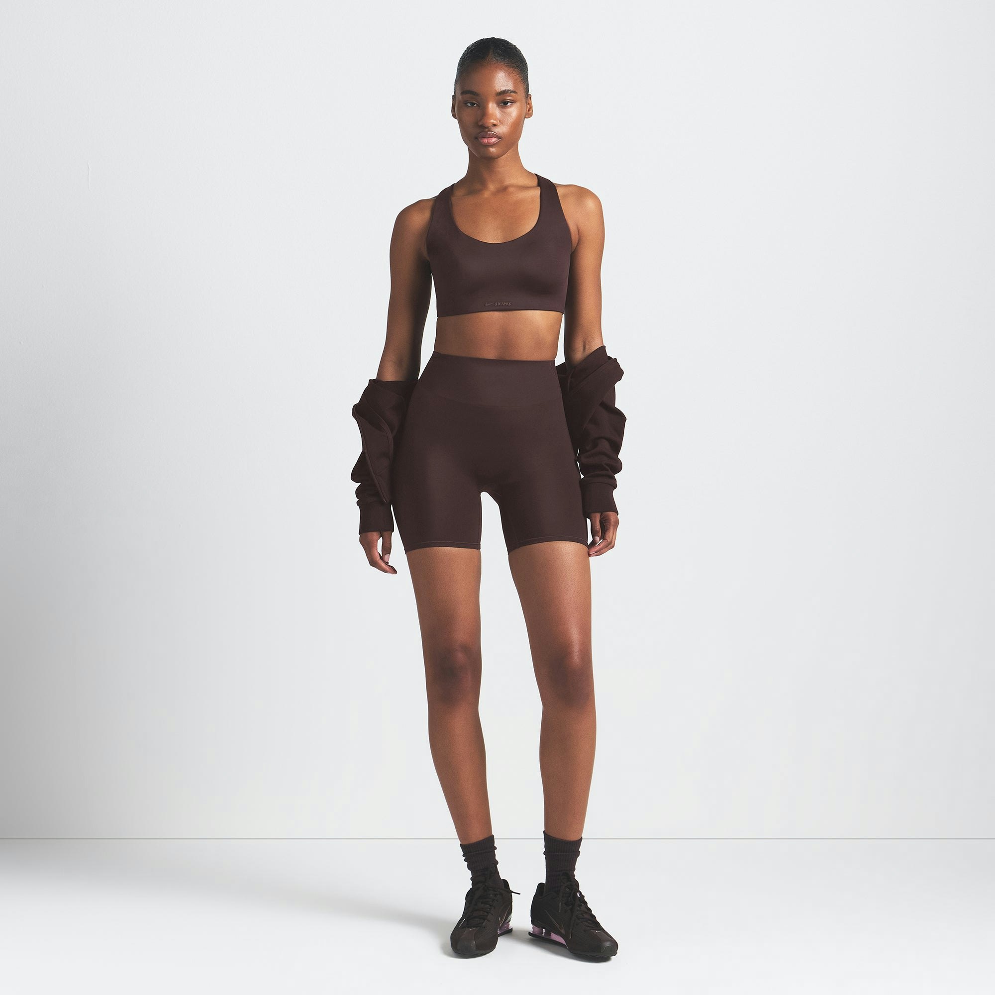 NikeSKIMS SHINE RACER BACK BRA | PHOENIX ON A MODEL FRONT VIEW @ | FOCUS: 0.9, 0.1, 0.7