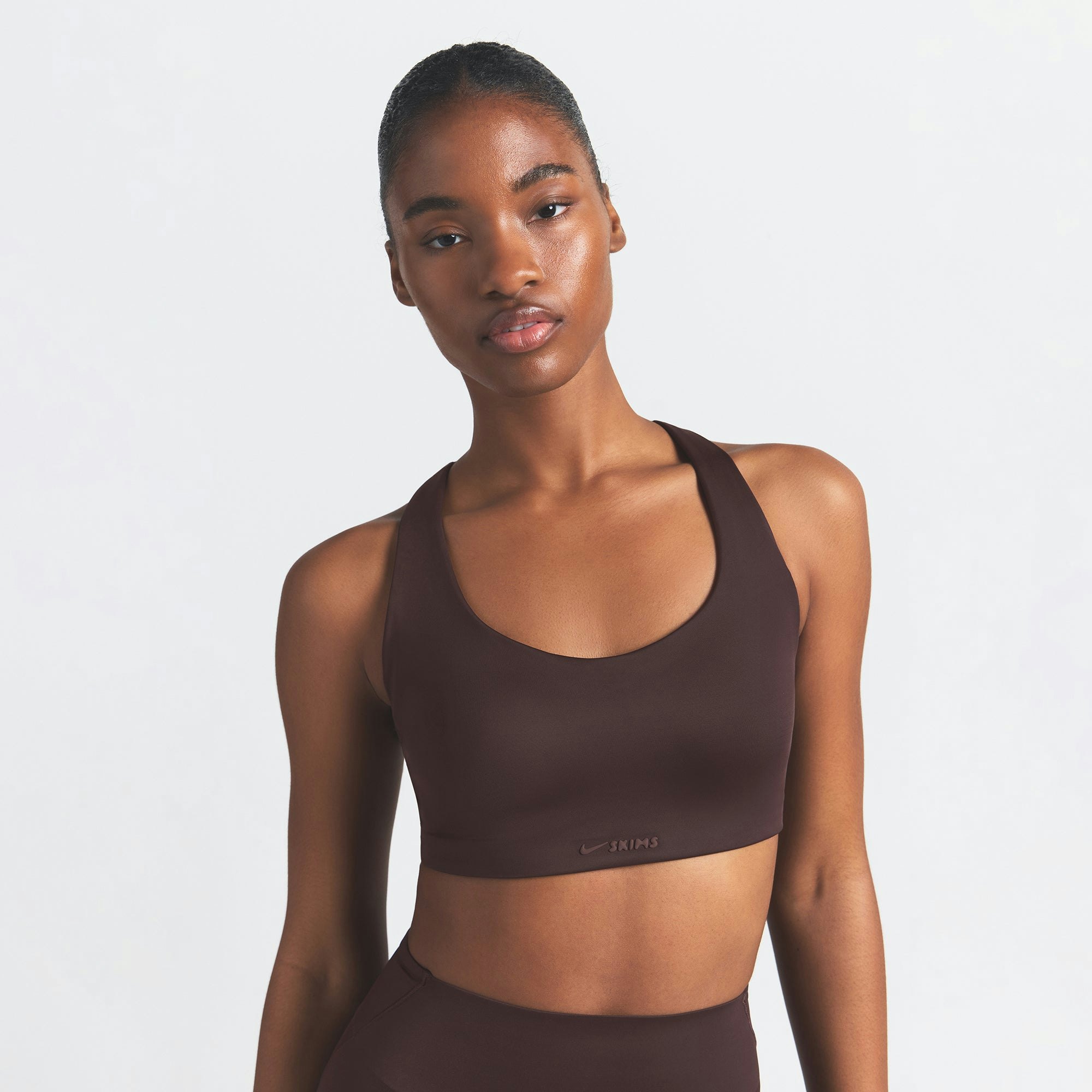 NikeSKIMS SHINE RACER BACK BRA | PHOENIX ON A MODEL SIDE VIEW