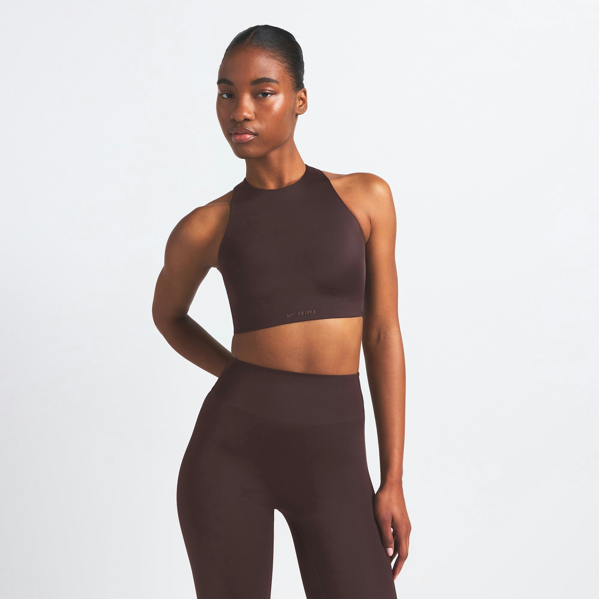 NikeSKIMS SHINE HIGH NECK BRA | PHOENIX ON A MODEL SIDE VIEW