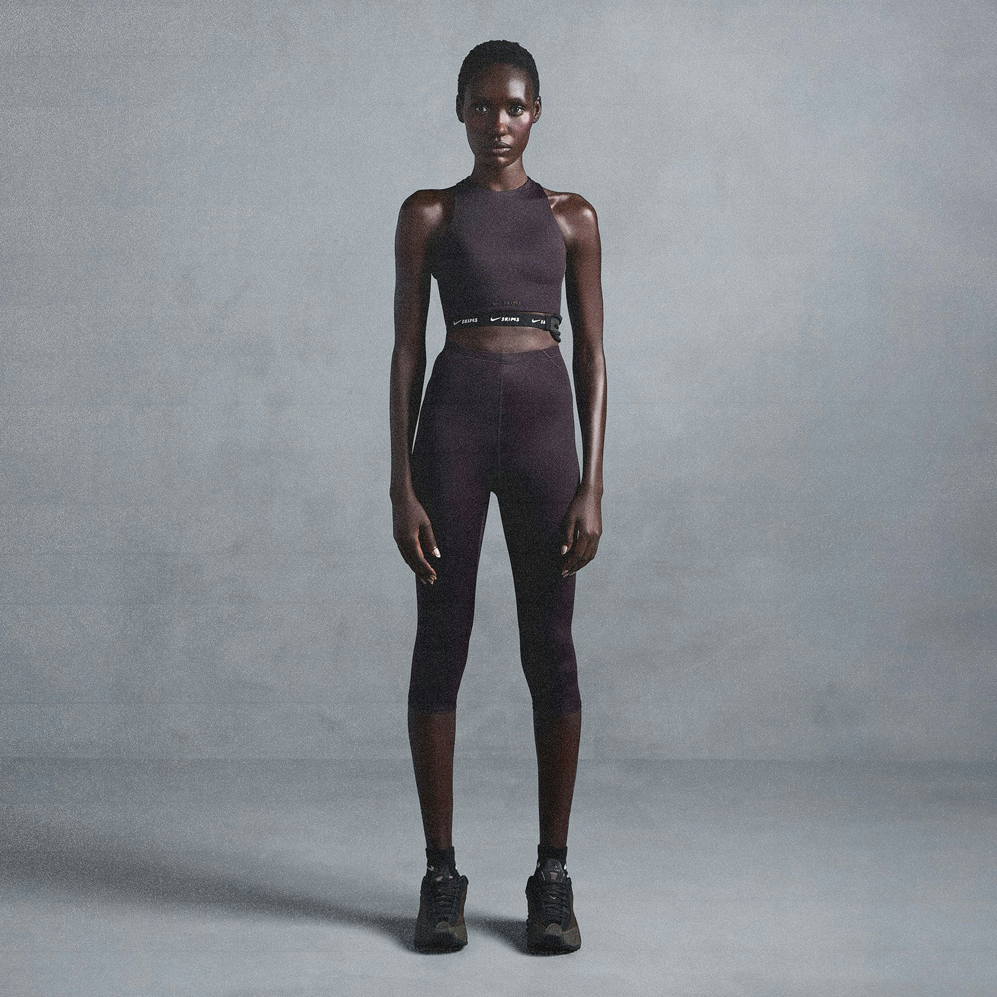 NikeSKIMS SHINE HIGH NECK BRA | PHOENIX ON A MODEL SIDE VIEW @ | FOCUS: 0.0, 1.0, 0.9