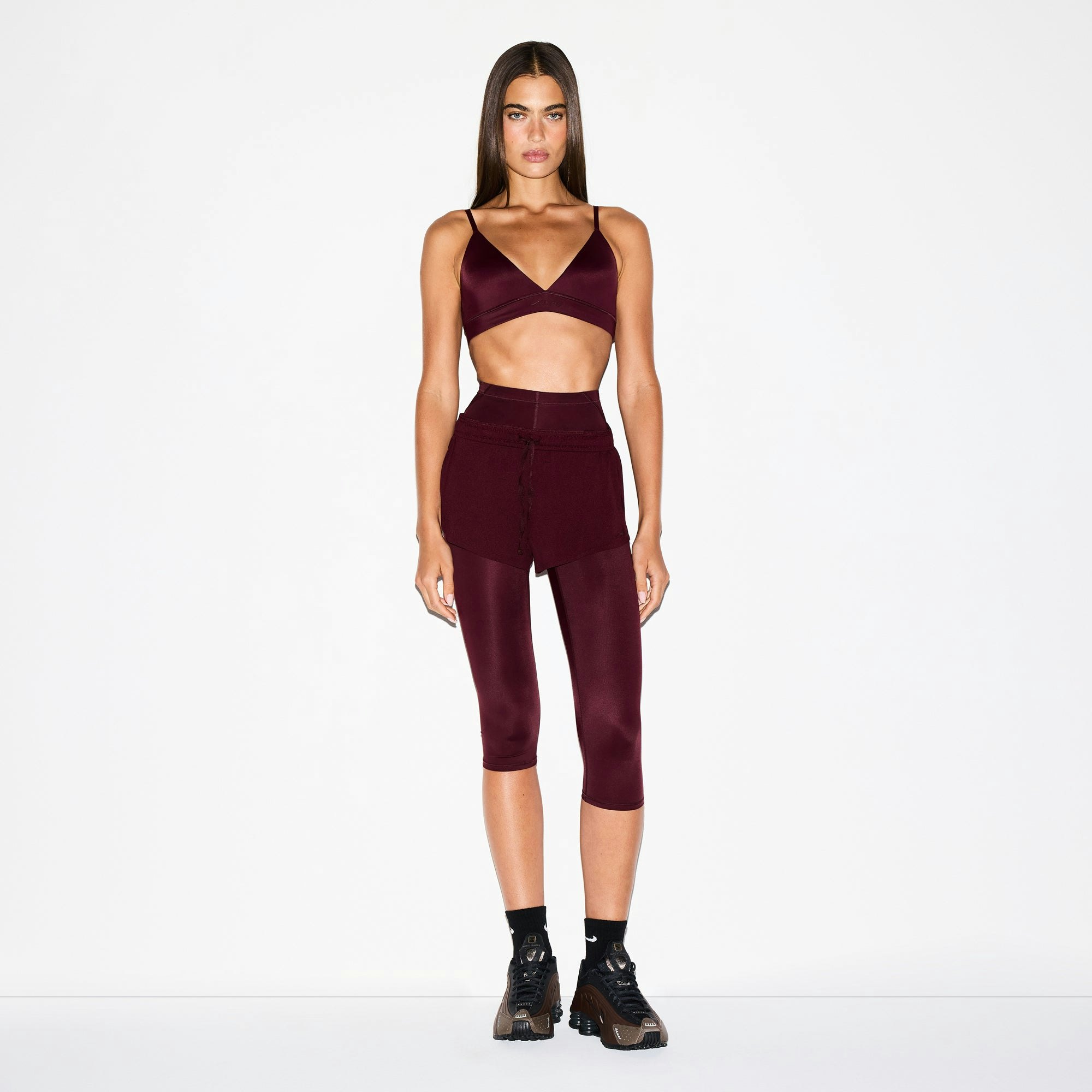 NikeSKIMS SHINE TRIANGLE BRA | CURRANT ON A MODEL FRONT VIEW @ | FOCUS: 0.0, 1.0, 0.9