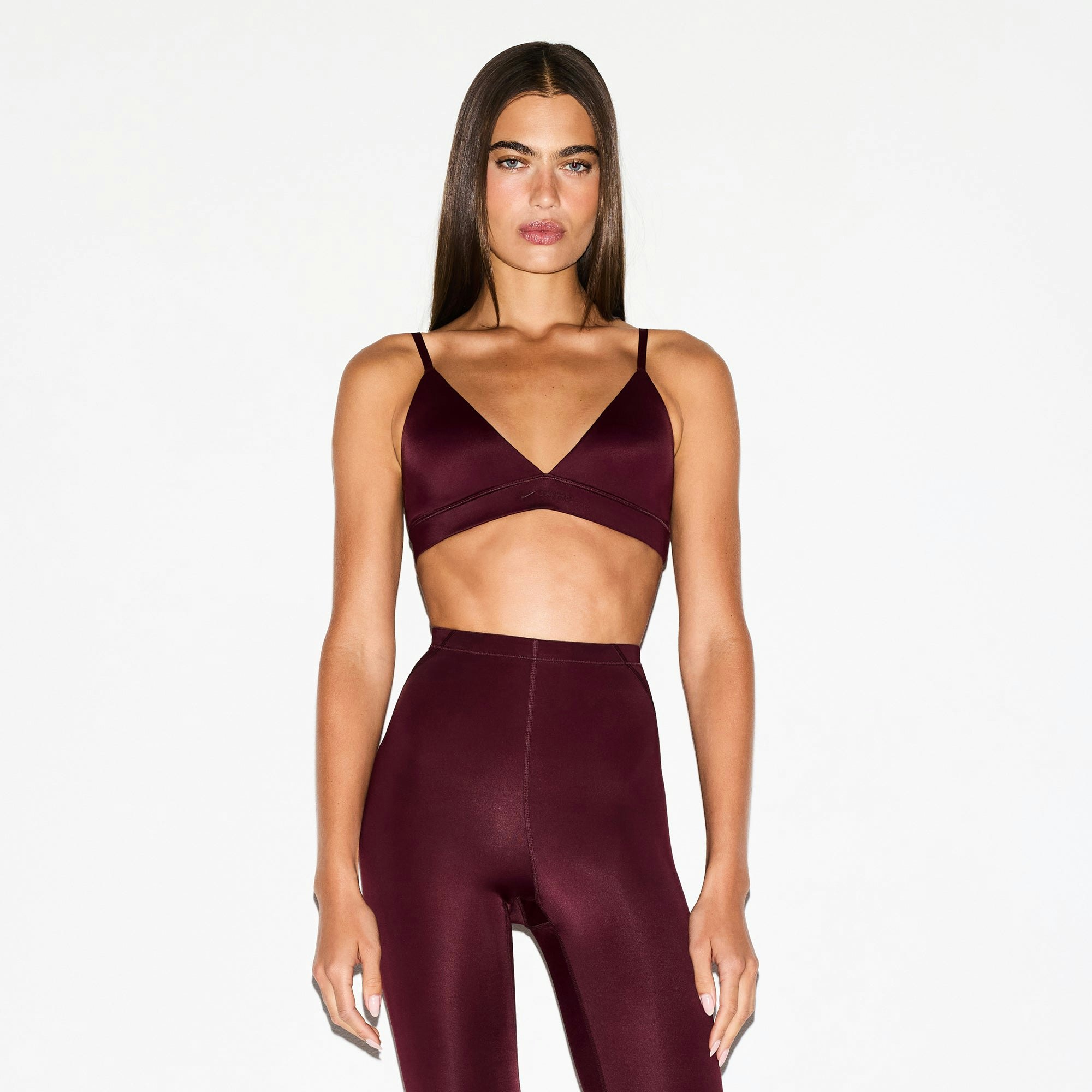 NikeSKIMS SHINE TRIANGLE BRA | CURRANT ON A MODEL SIDE VIEW @ | FOCUS: 0.0, 1.0, 0.9