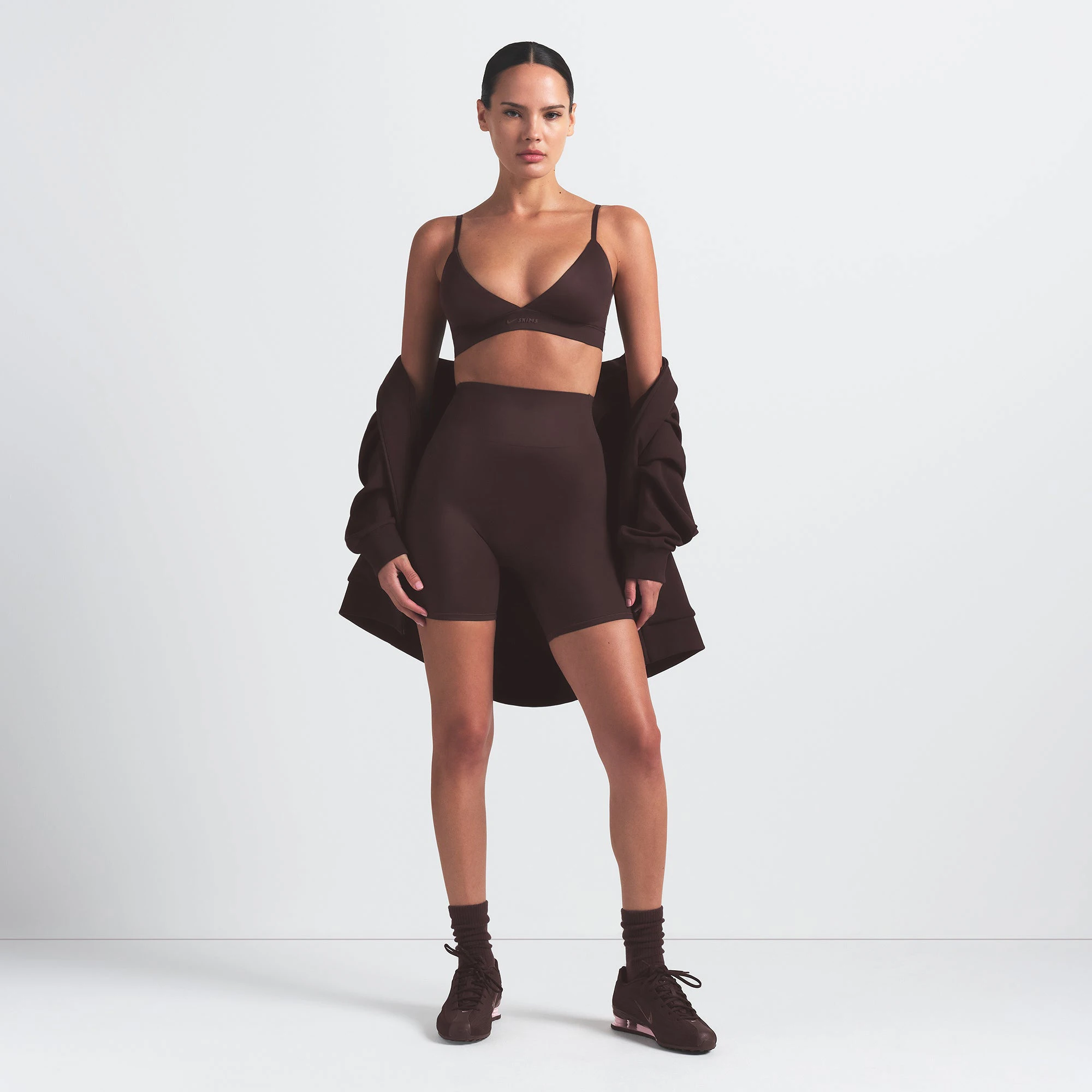 NikeSKIMS SHINE TRIANGLE BRA | PHOENIX ON A MODEL FRONT VIEW @ | FOCUS: 0.9, 0.1, 0.7