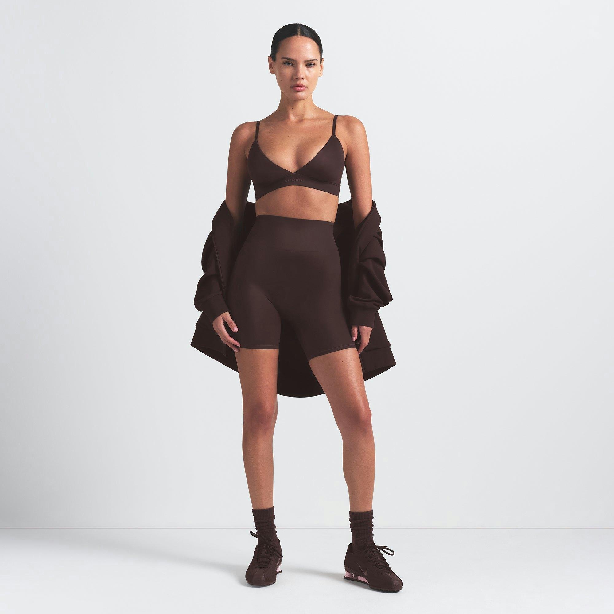 NikeSKIMS SHINE TRIANGLE BRA | PHOENIX ON A MODEL FRONT VIEW @ | FOCUS: 0.9, 0.1, 0.7